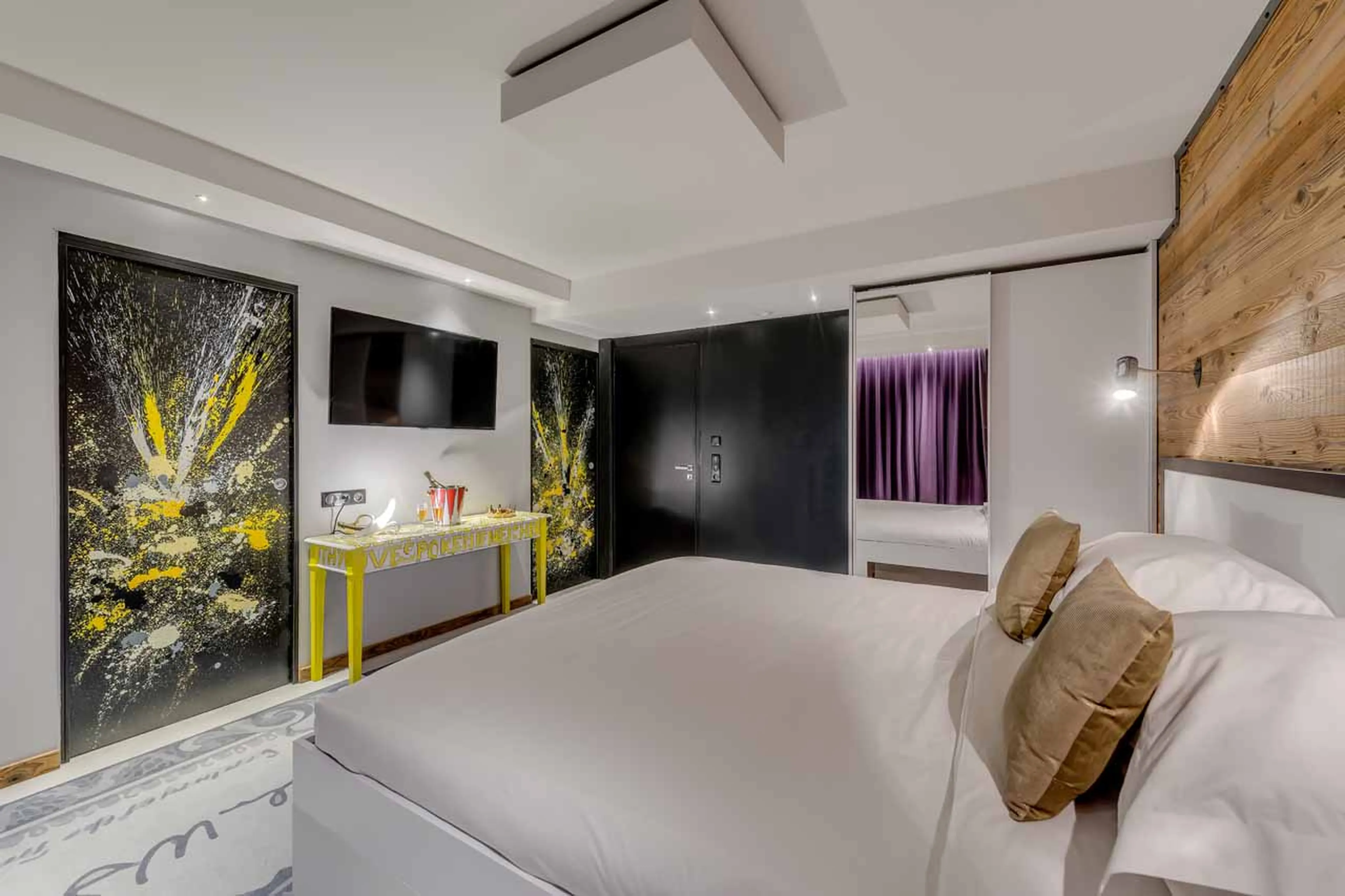 TV in bedroom at Chalet Banksy in Tignes