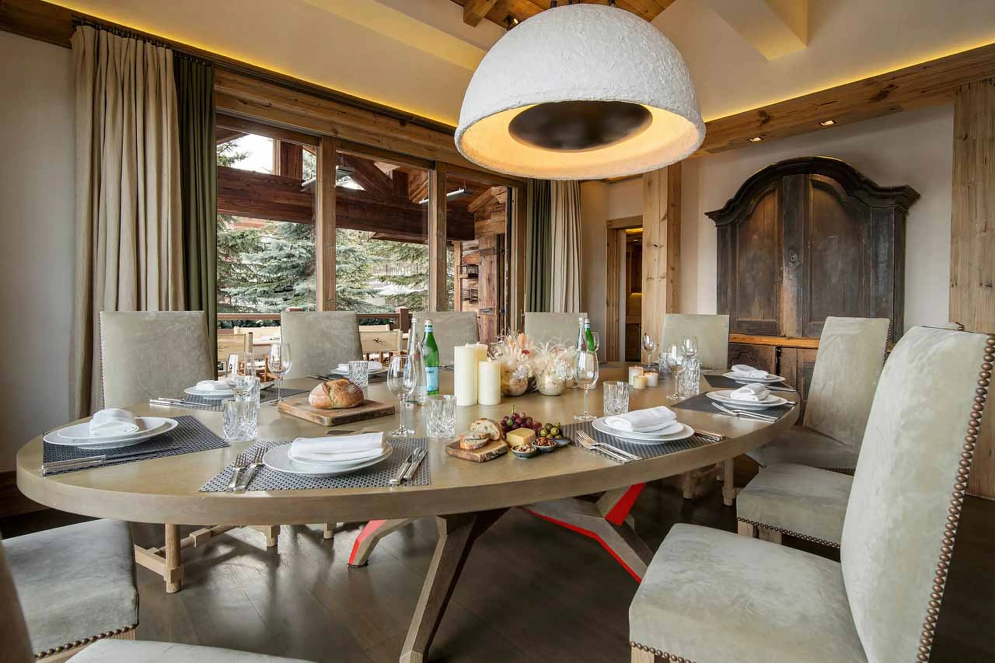 Dining area with terrace access of Chalet Les Bastidons in Courchevel 1850
