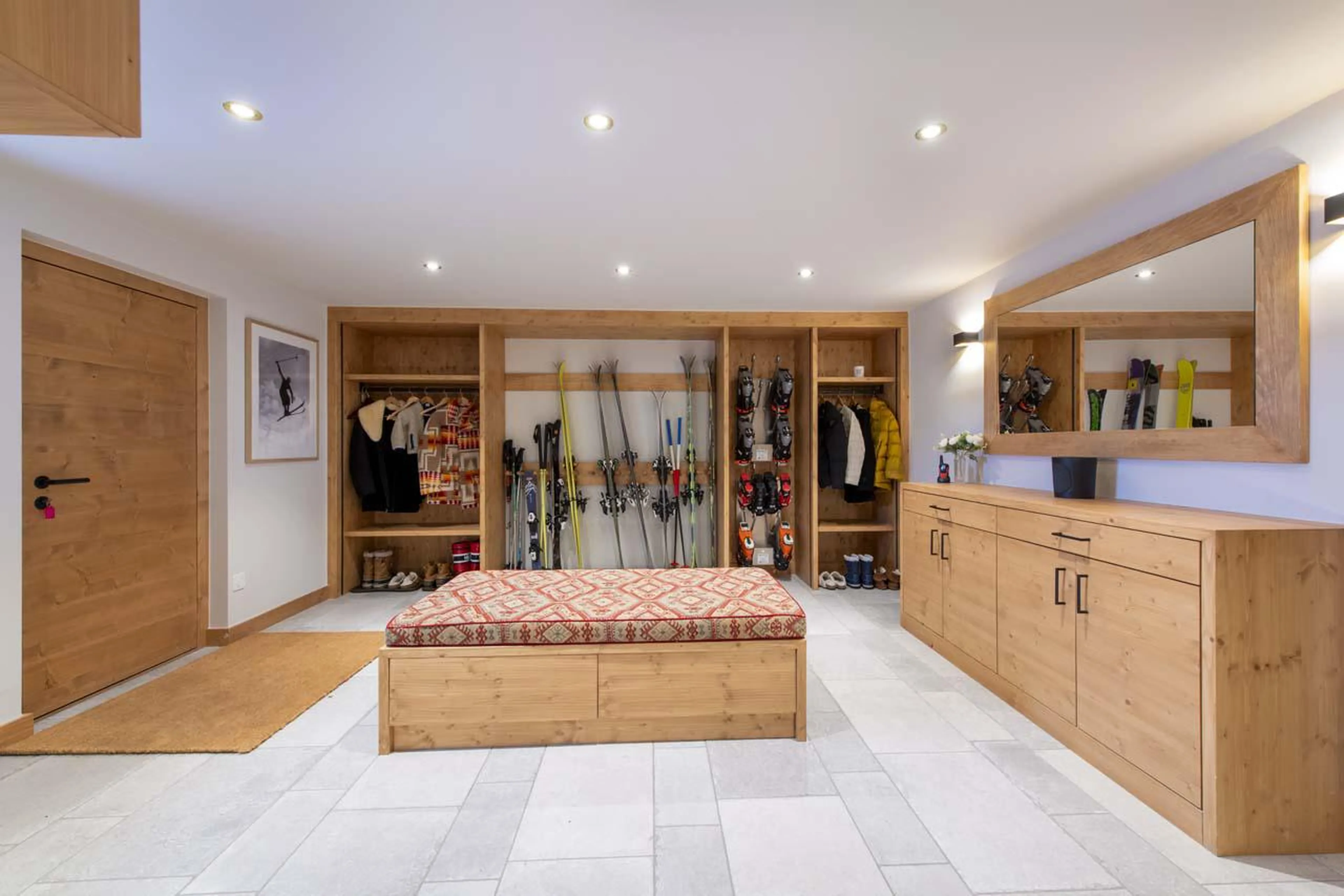 Ski room with boot warmers and ample storage at Chalet Bavaria in Verbier