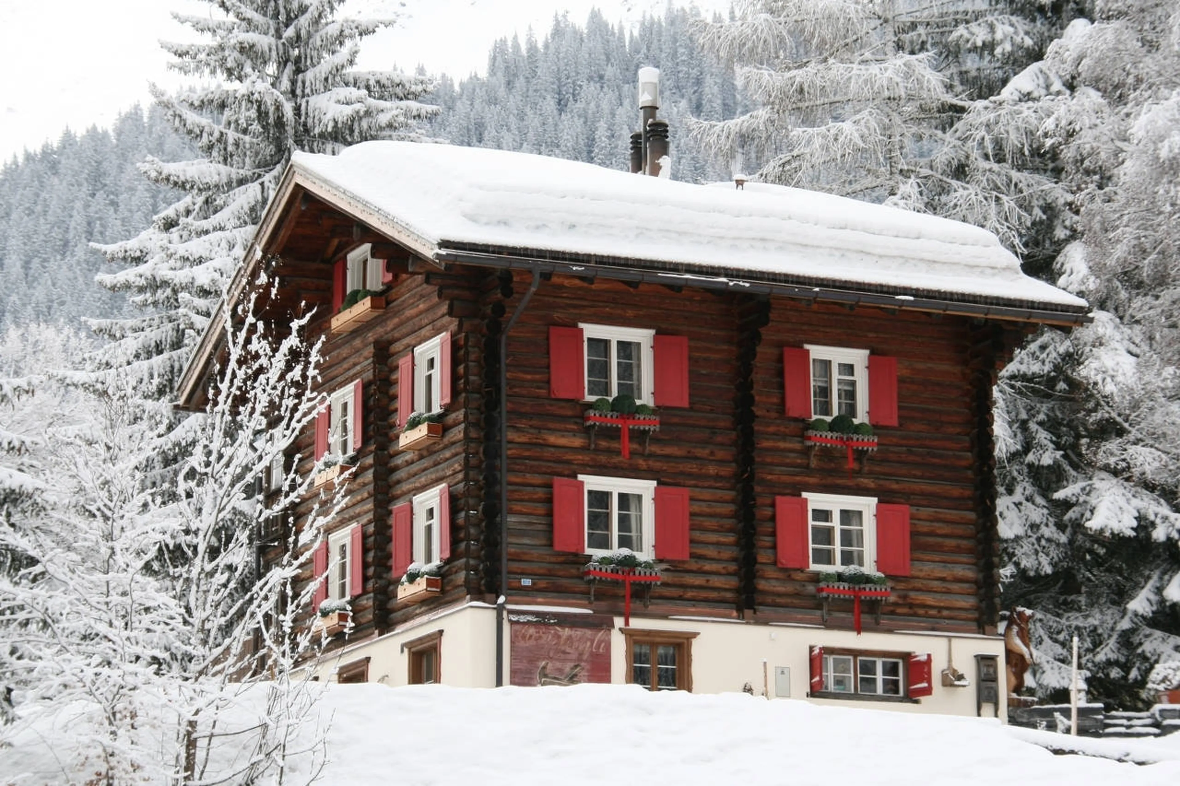 Exterior view of four-floored Chalet Bear in Klosters