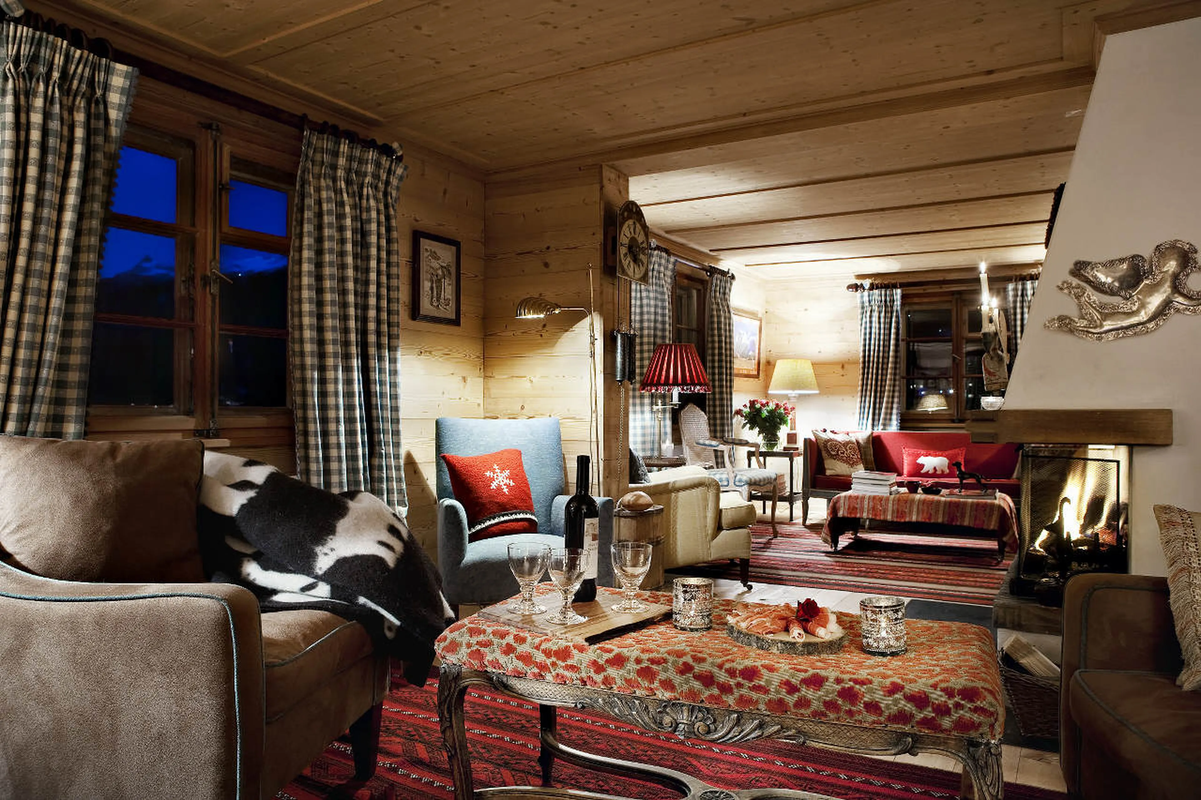 Entrance hall of Chalet Bear in Klosters leads to two lounge areas