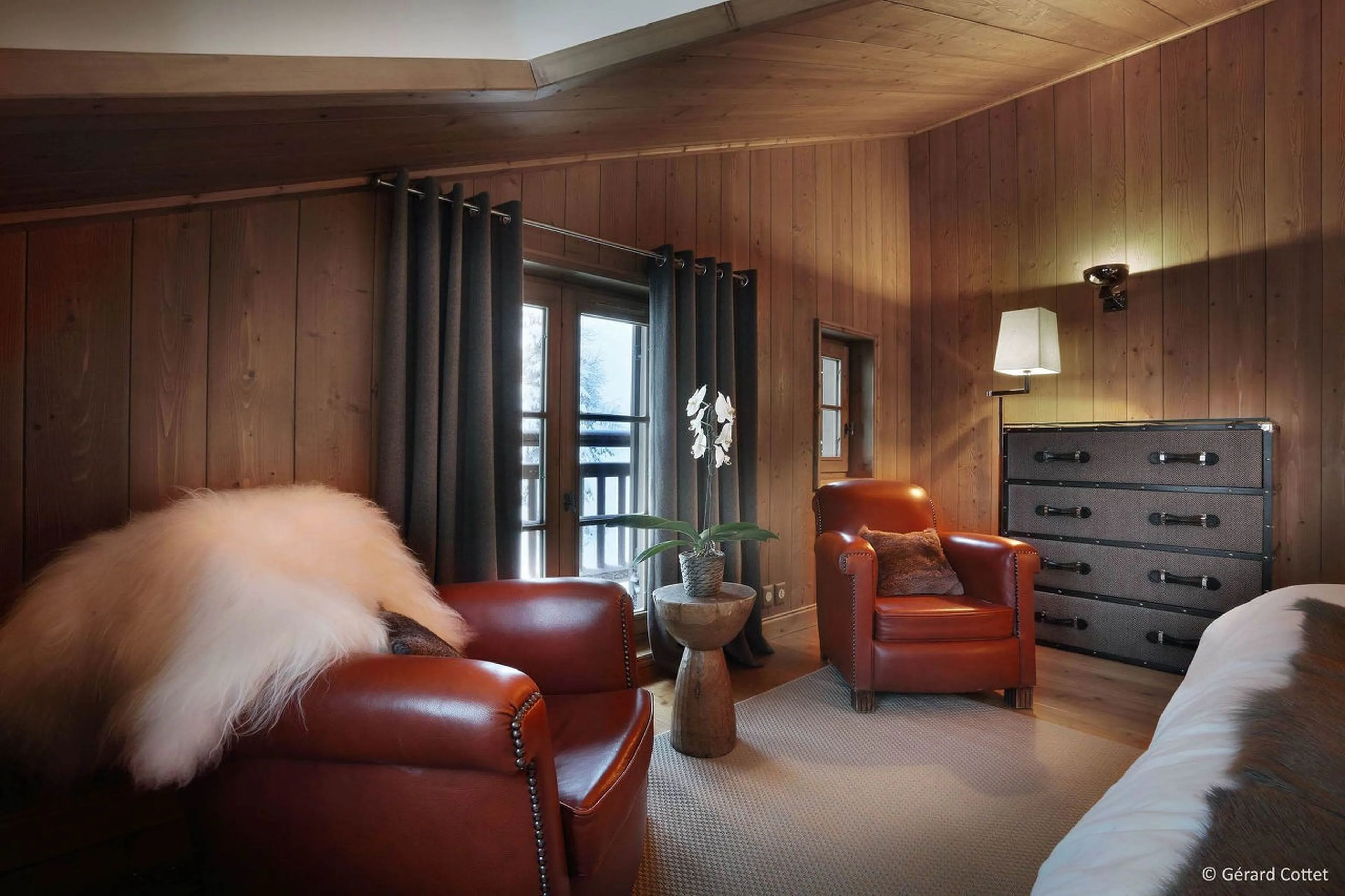Seating and access to private balcony in Chalet Beaumont in Courchevel 1650
