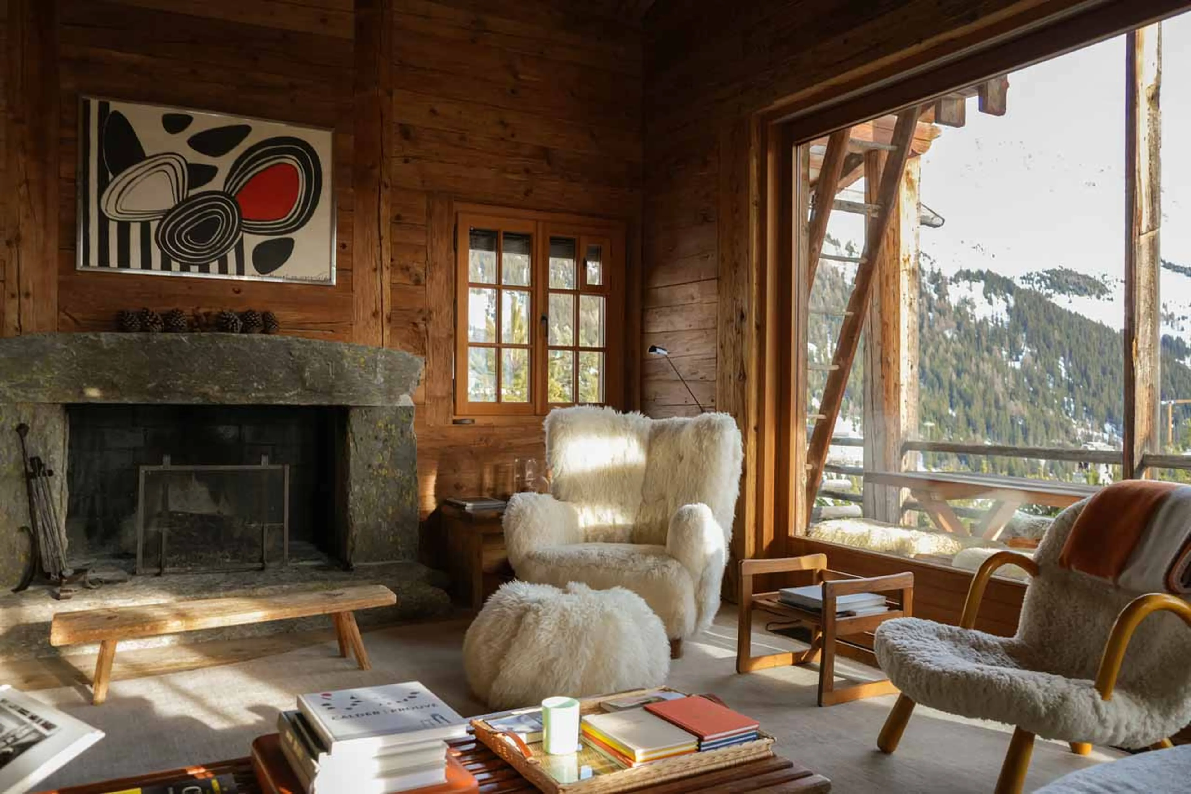 Living area with fireplace at Chalet Bibi in Verbier