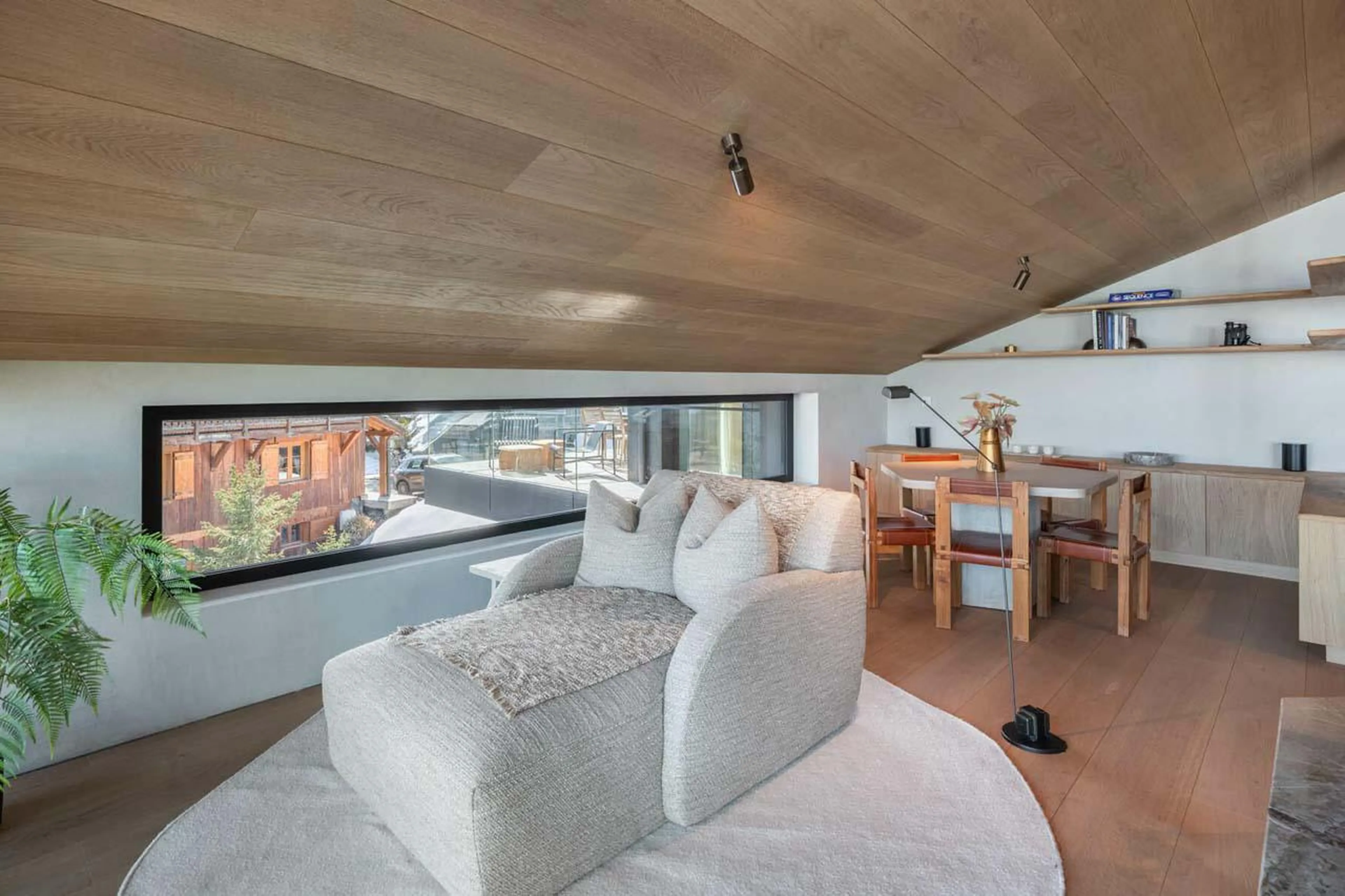 Cosy sofa and table at Chalet Black Lodge in Courchevel 1850