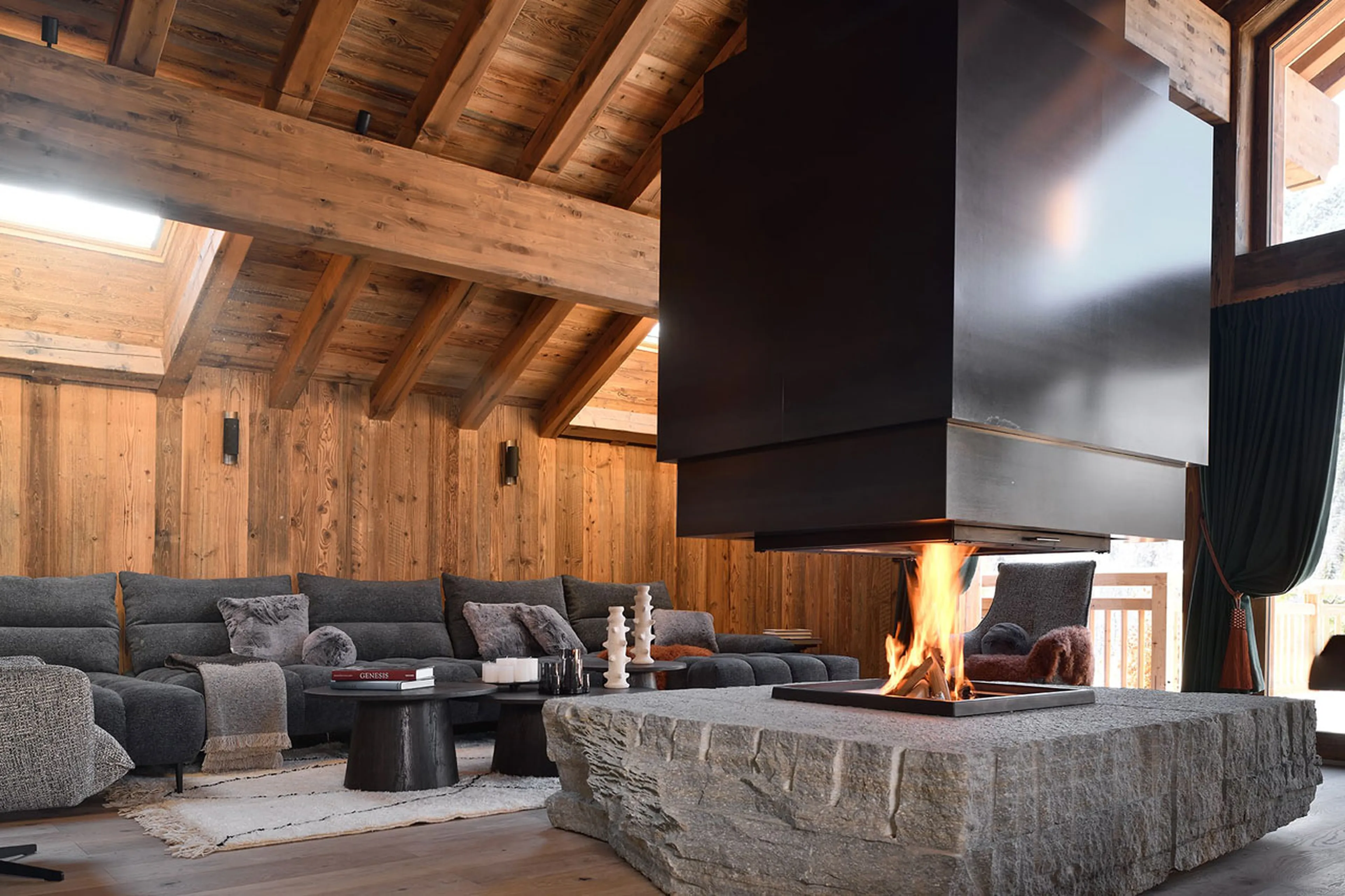 Living area fireplace at Chalet Black Peak in Meribel