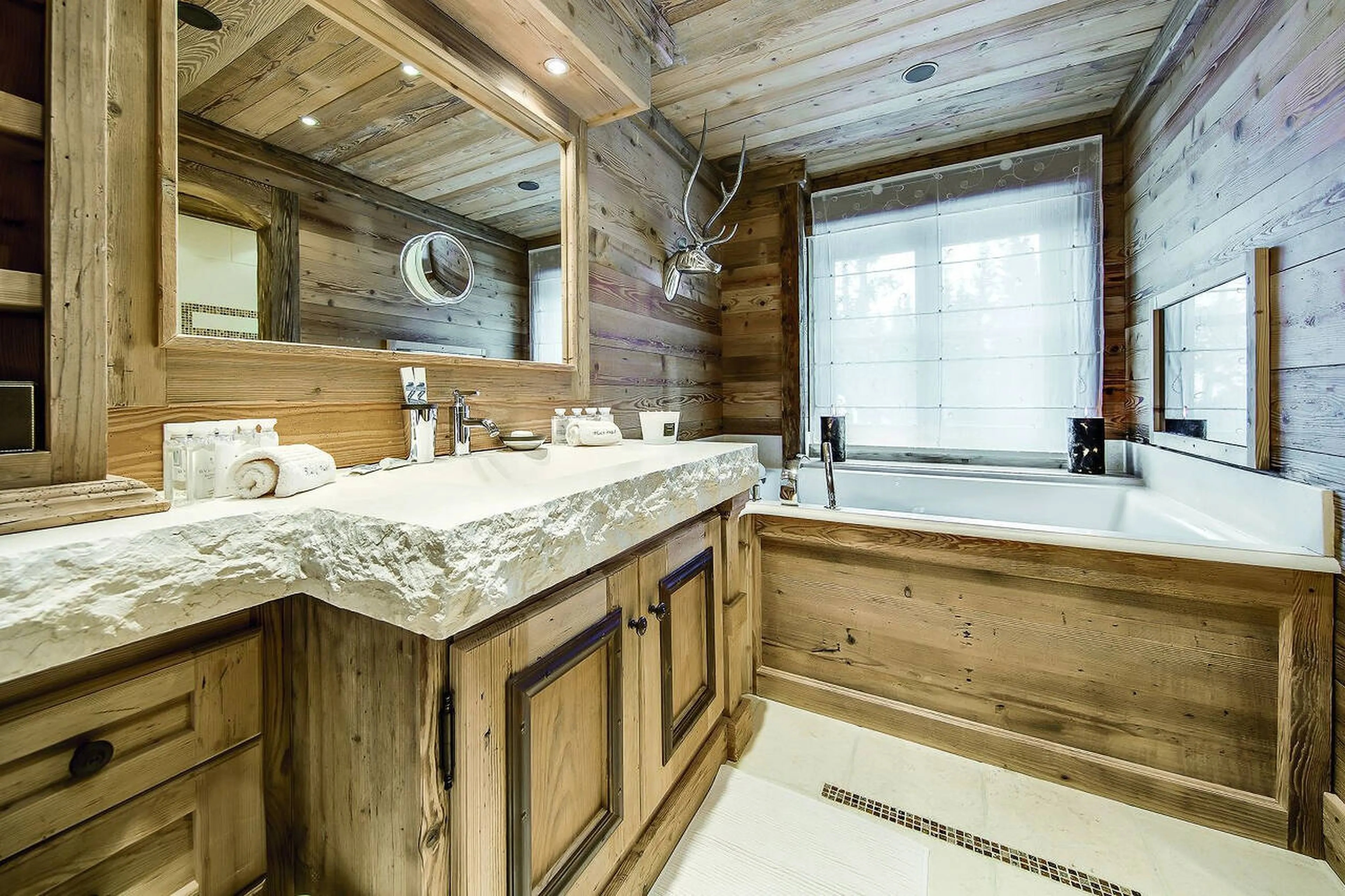 Bathroom, in old wood, en suite to master bedroom in Chalet Black Pearl in Courchevel 1850