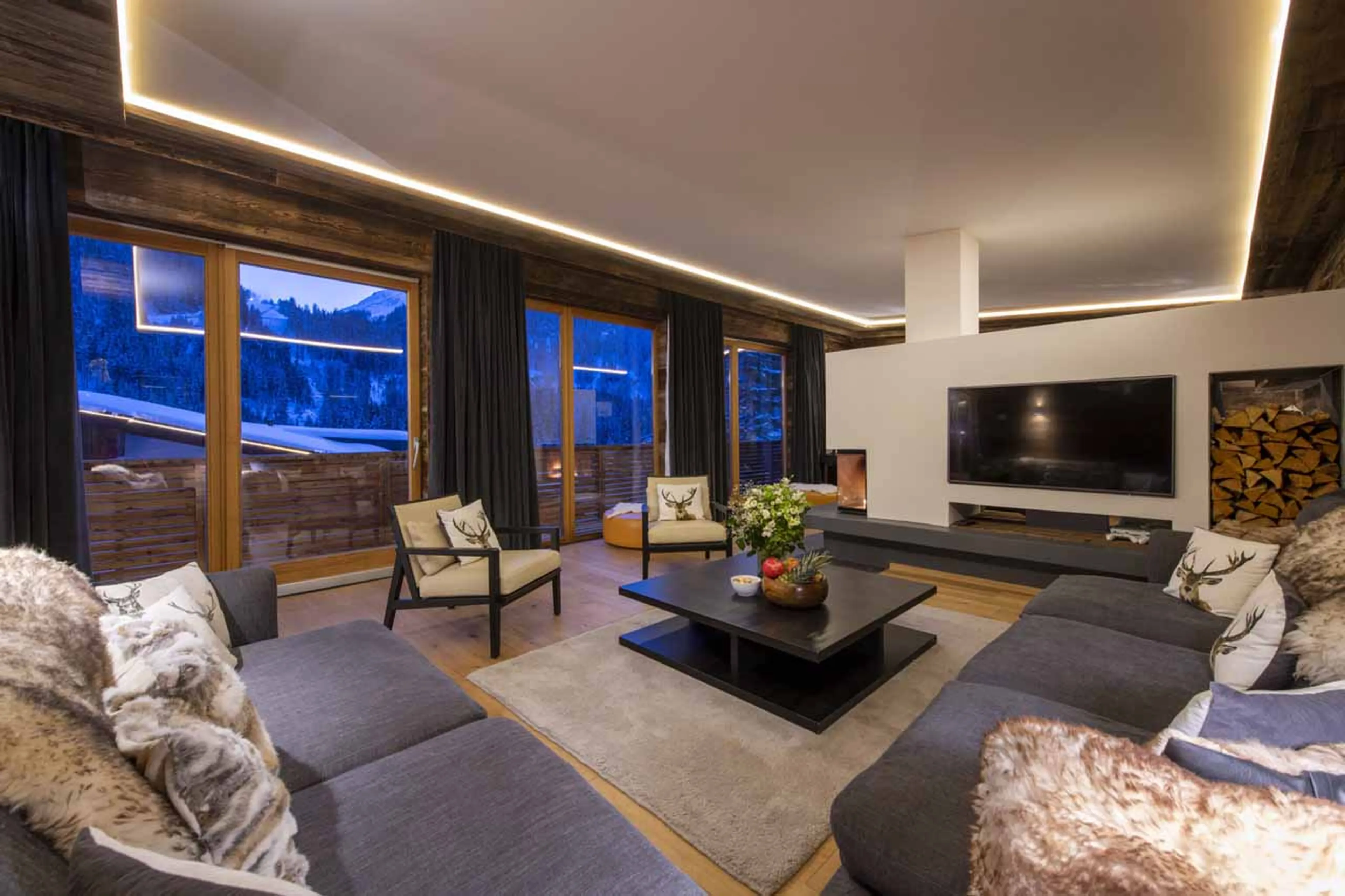 Living area and balcony at Chalet Bluebird in St Anton