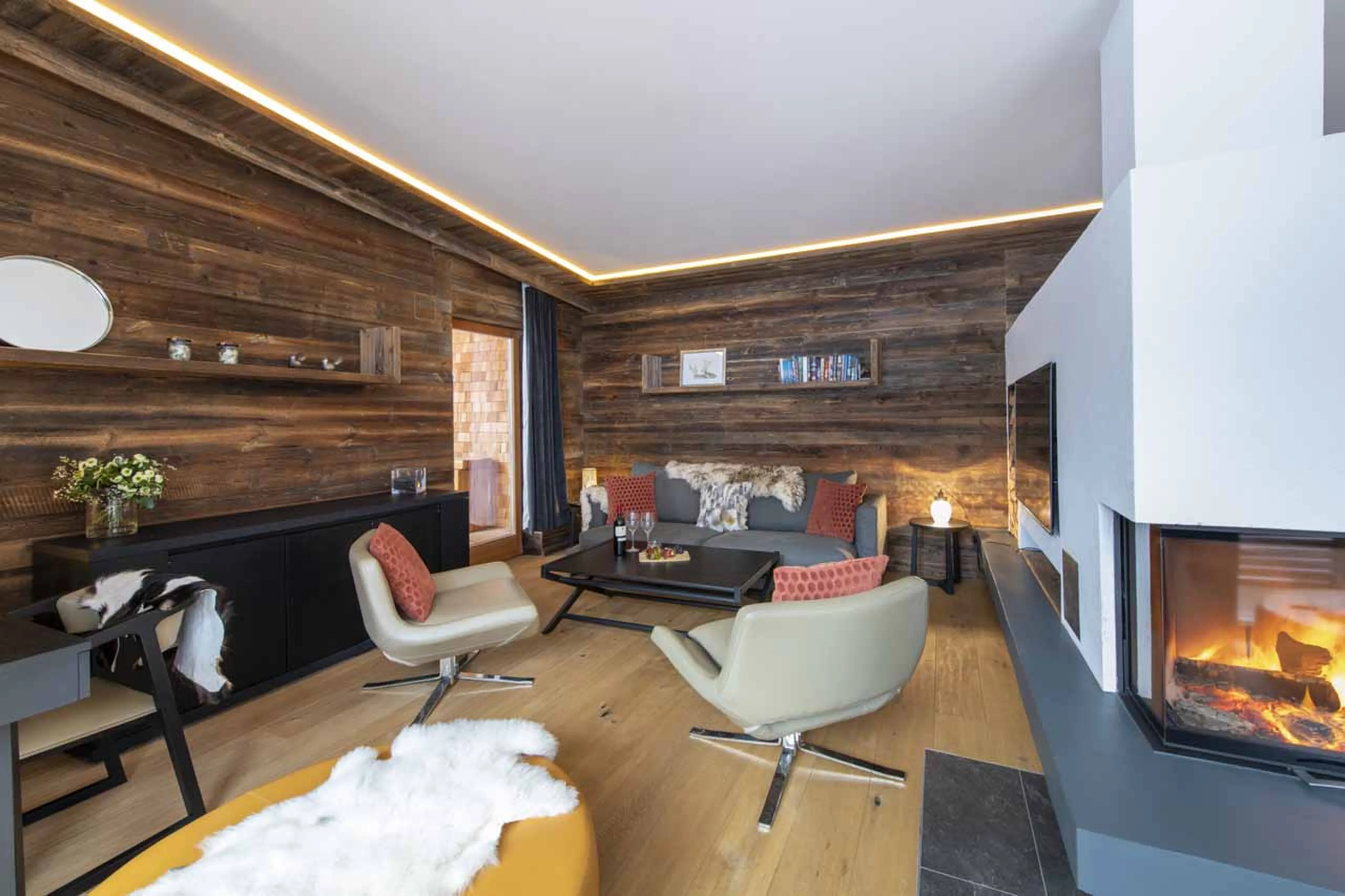 Cosy living area with TV at Chalet Bluebird in St Anton