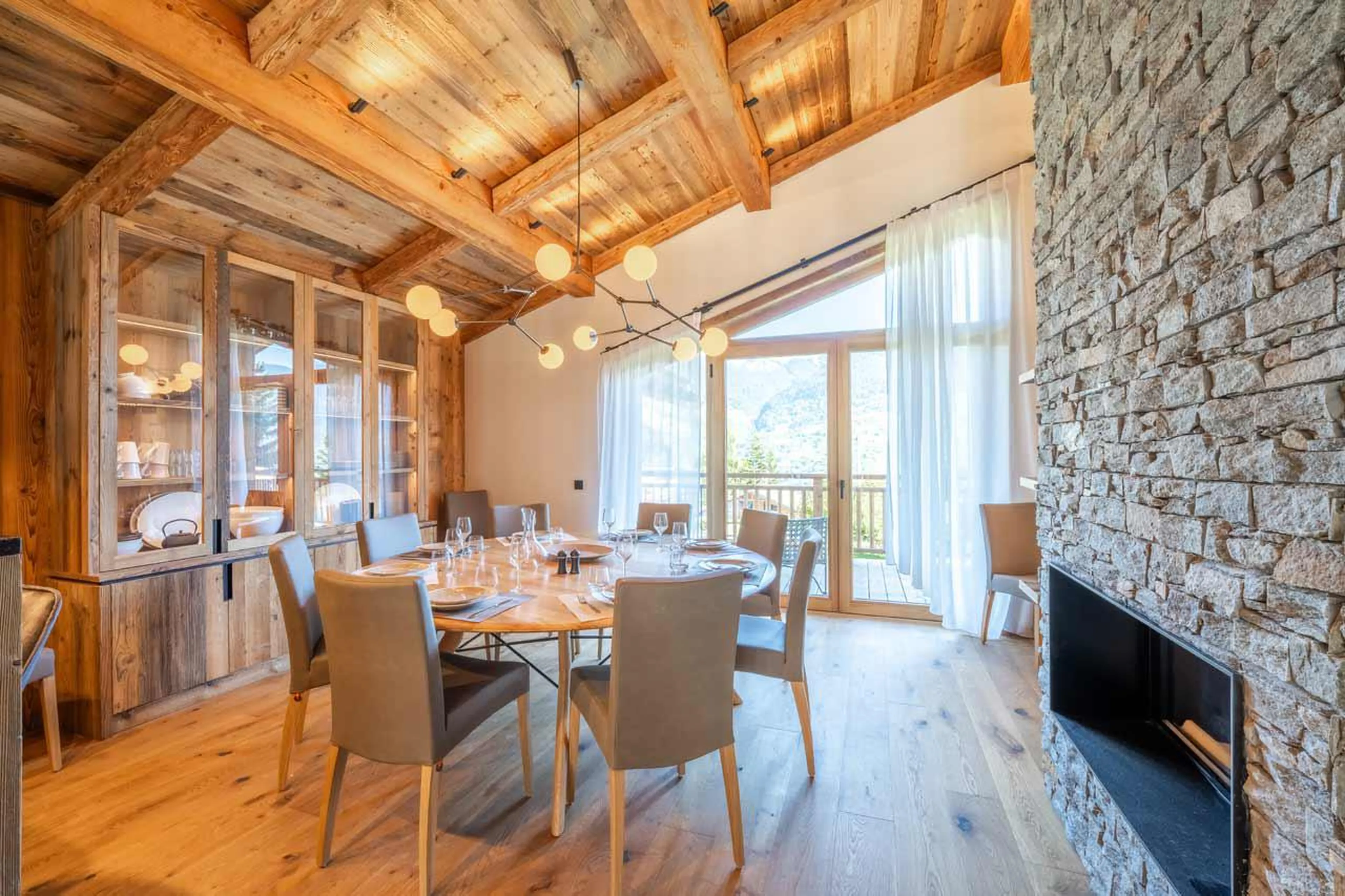 Living and dining area at Chalet Bois de l'Abbaye in Courchevel Le Praz