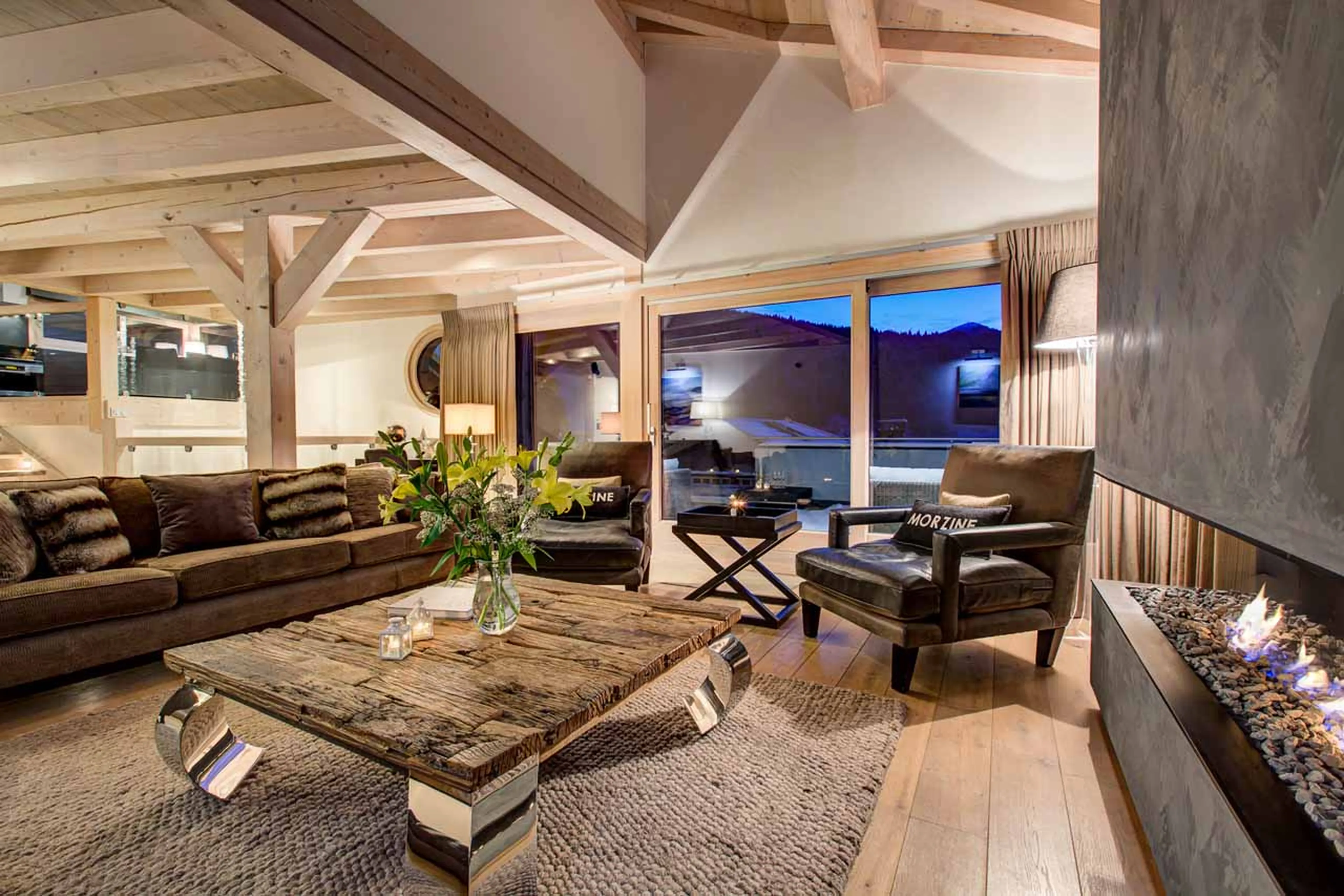 Modern fireplace in living room of Chalet Bouquetin in Morzine