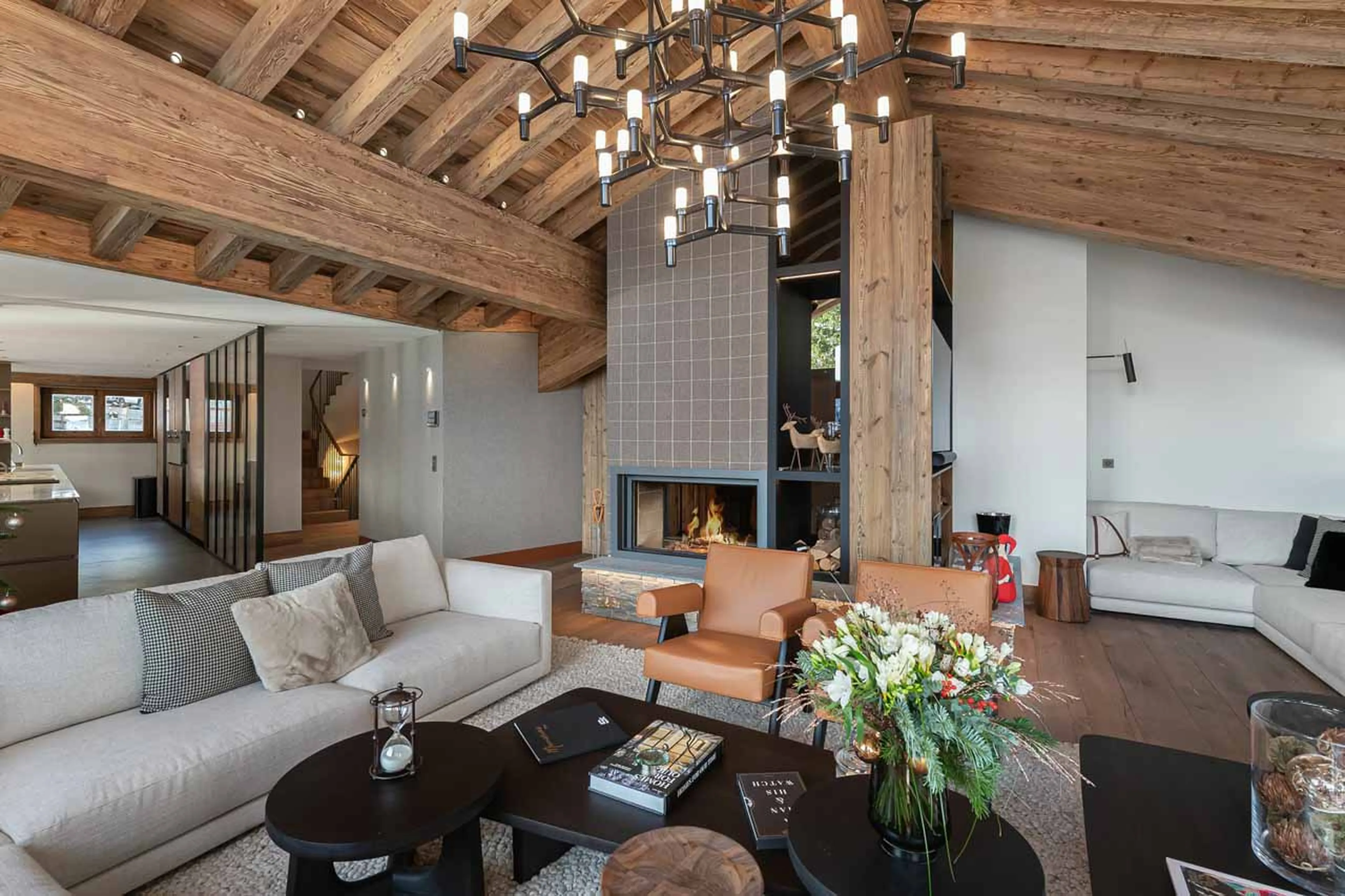 Fireplace in living area at Chalet Les Bruxellois in Courchevel 1850