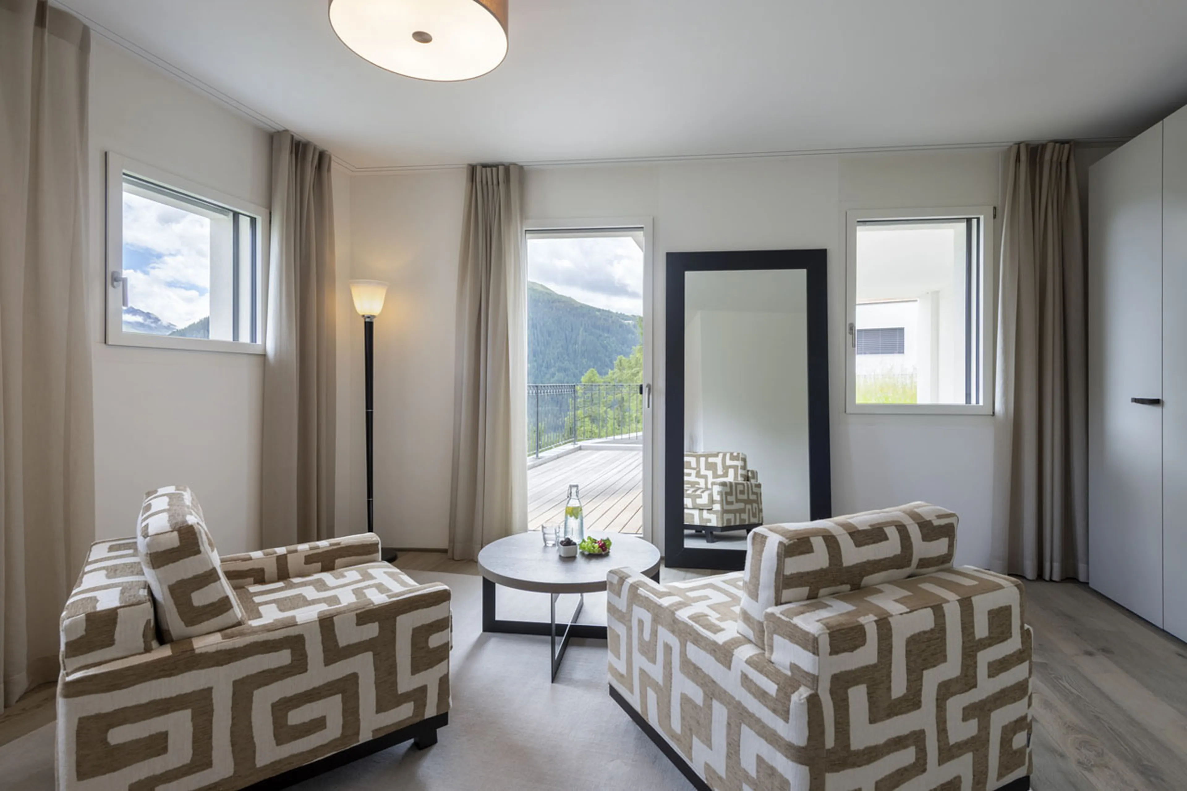 Seating and terrace access at Chalet Buelenhorn in Davos