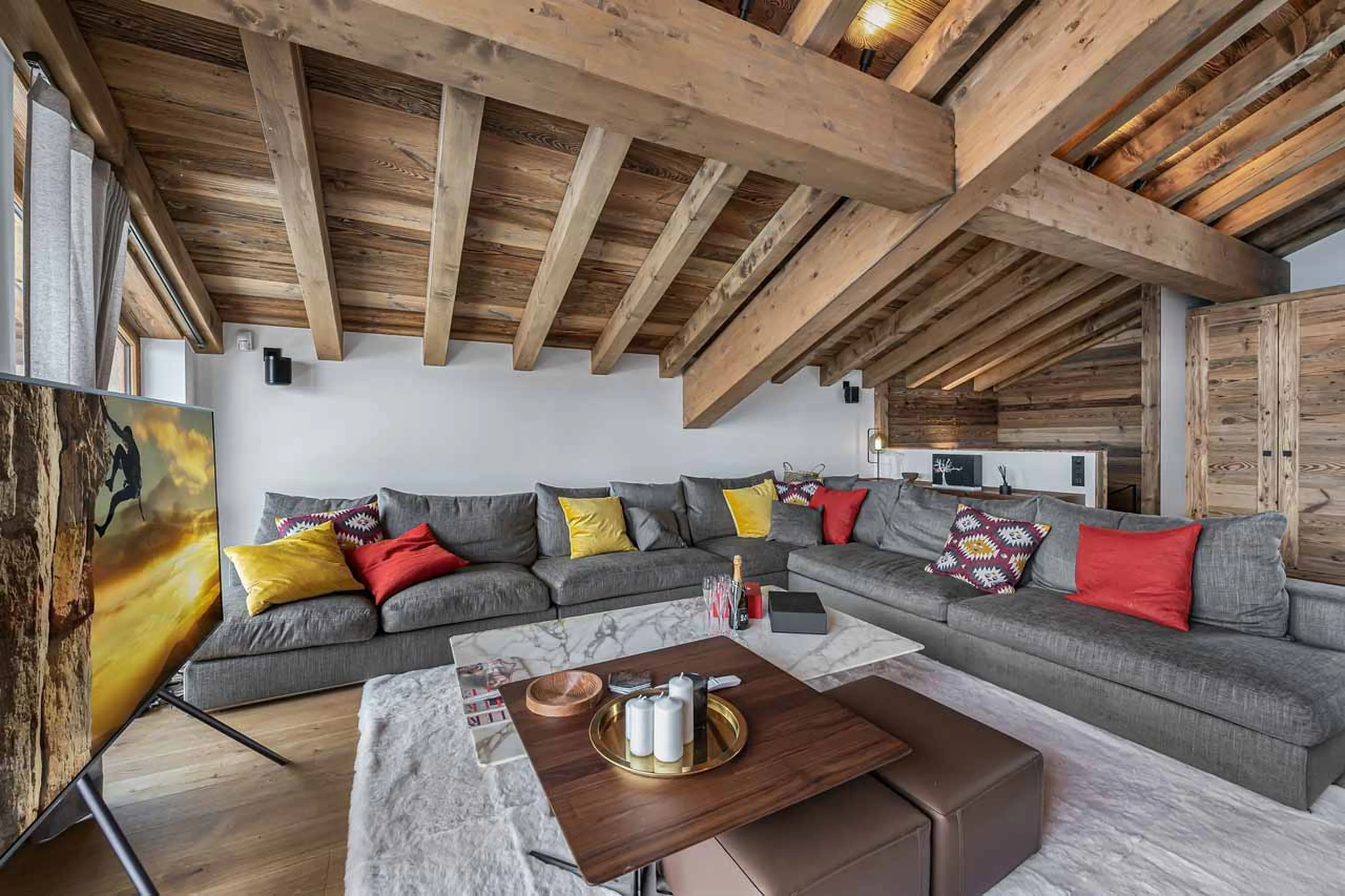 Sofas and TV in living area of Chalet Carcentina in Courchevel 1550