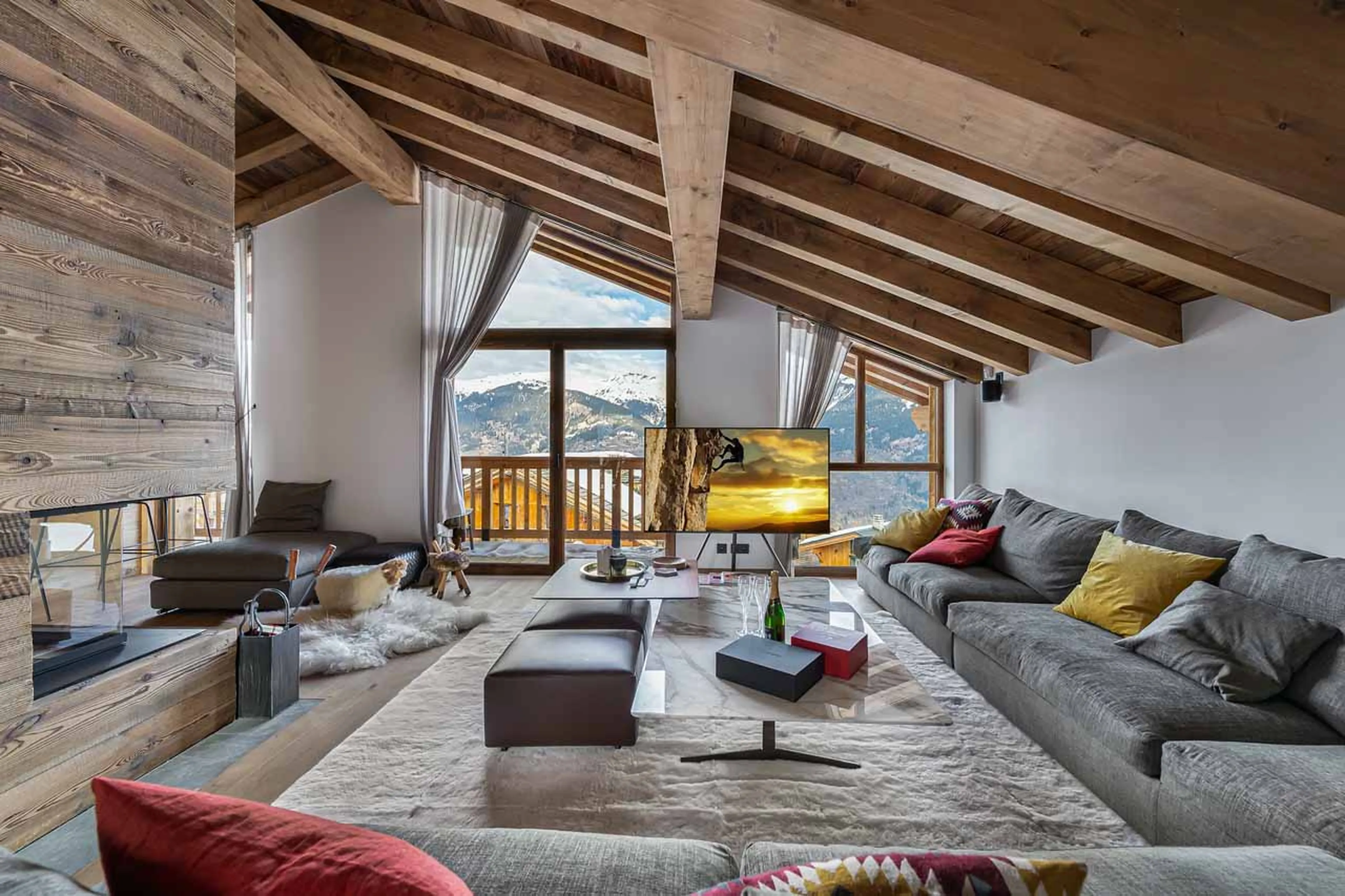Open plan living area at Chalet Carcentina in Courchevel 1550