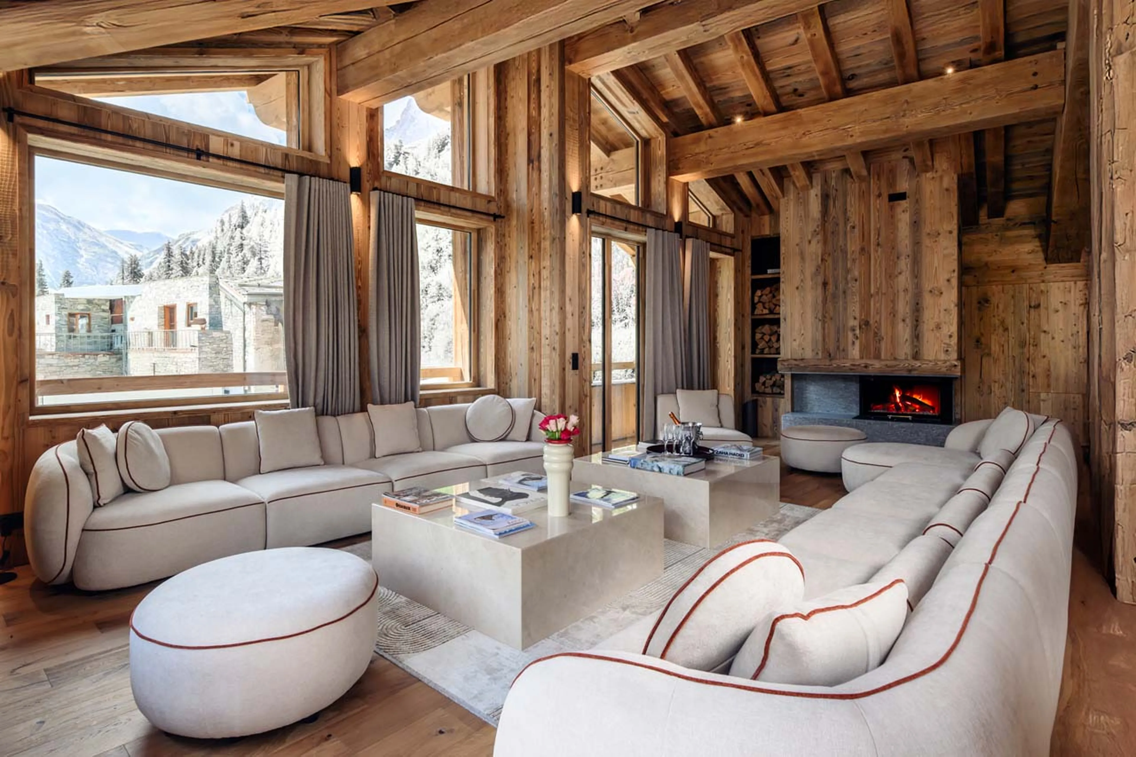 Sitting area with fireplace at Chalet Cervinia in Val d'Isere