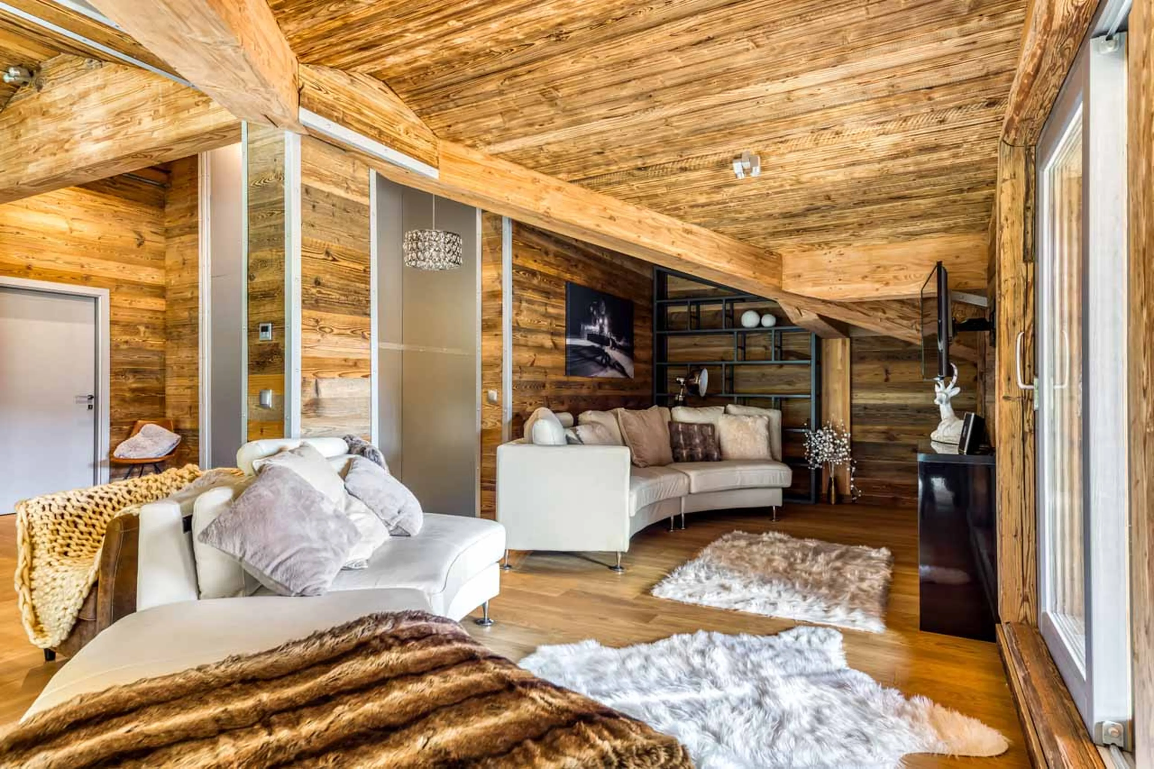 Open plan living area at Chalet Charlie in Tignes