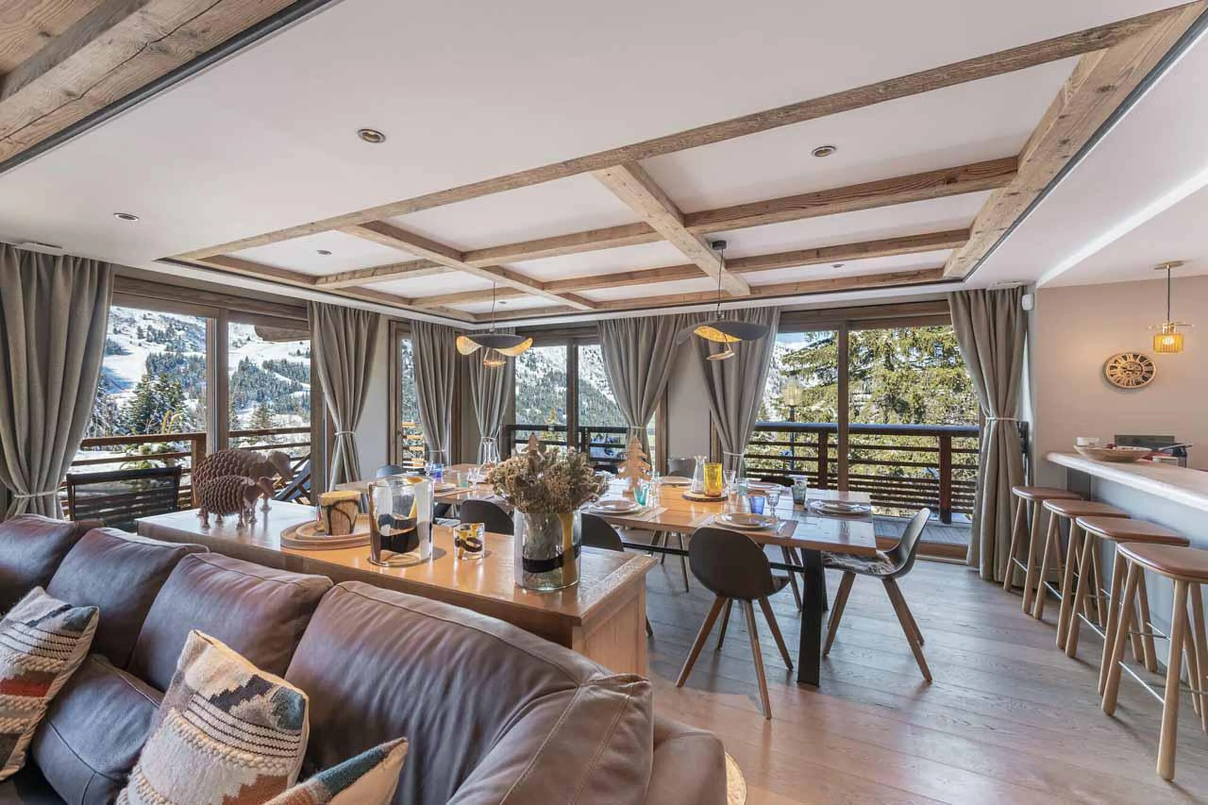 Living and dining area at Chalet Chergui in Meribel