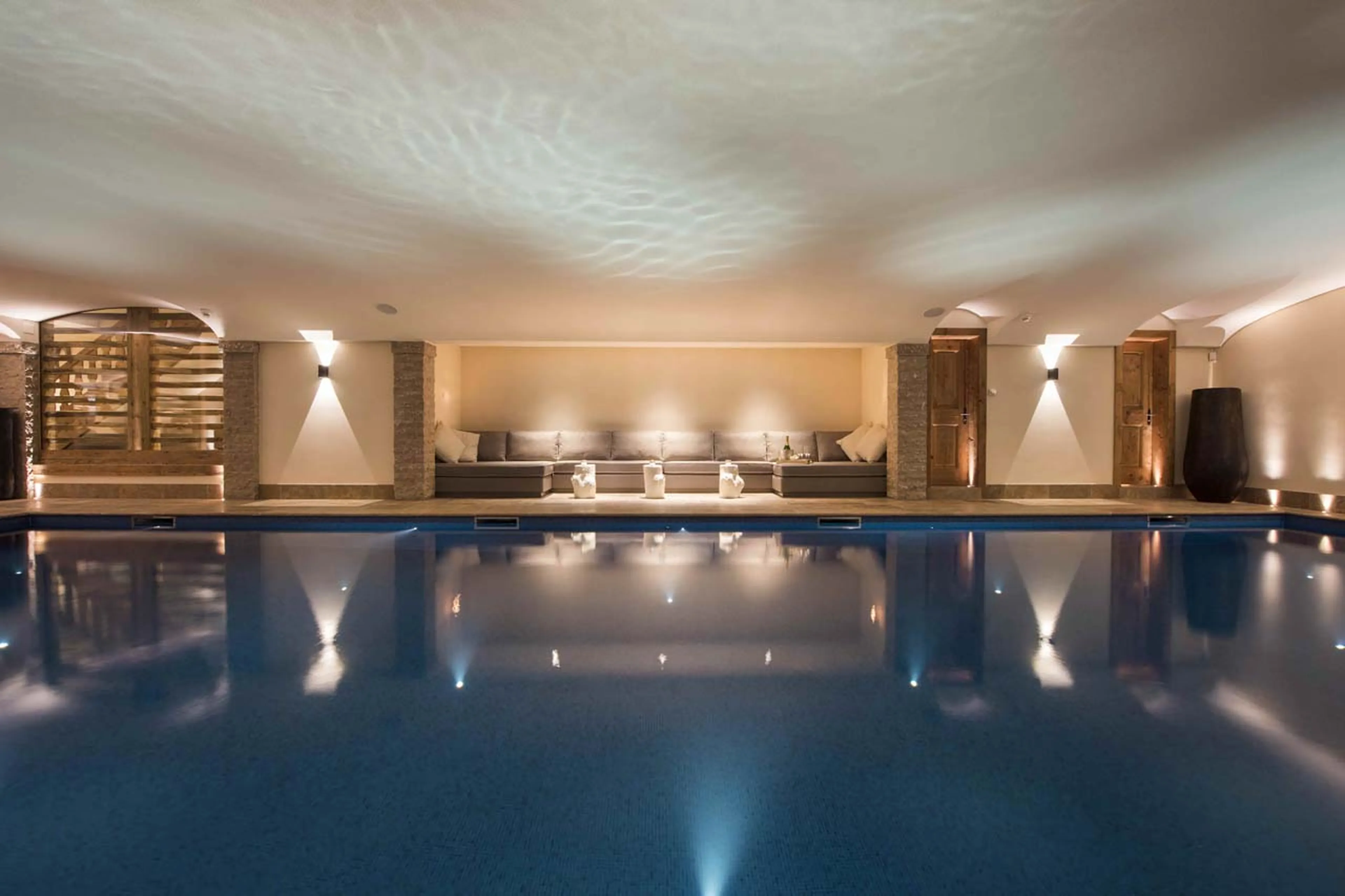 Relaxation area beside pool at Chalet Chouqui in Verbier