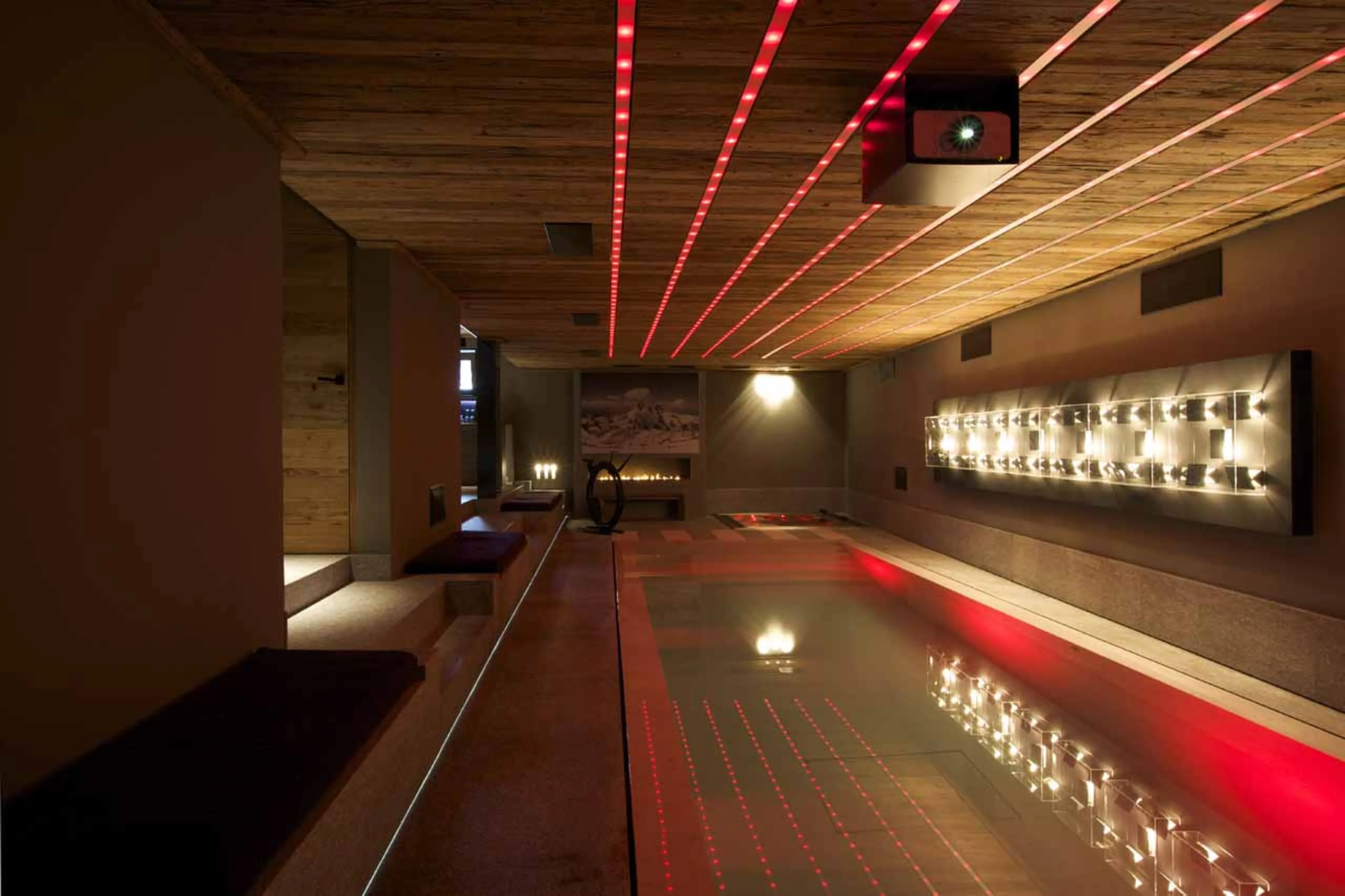 Pool with Jacuzzi at one end at Chalet Cyanella in Megeve