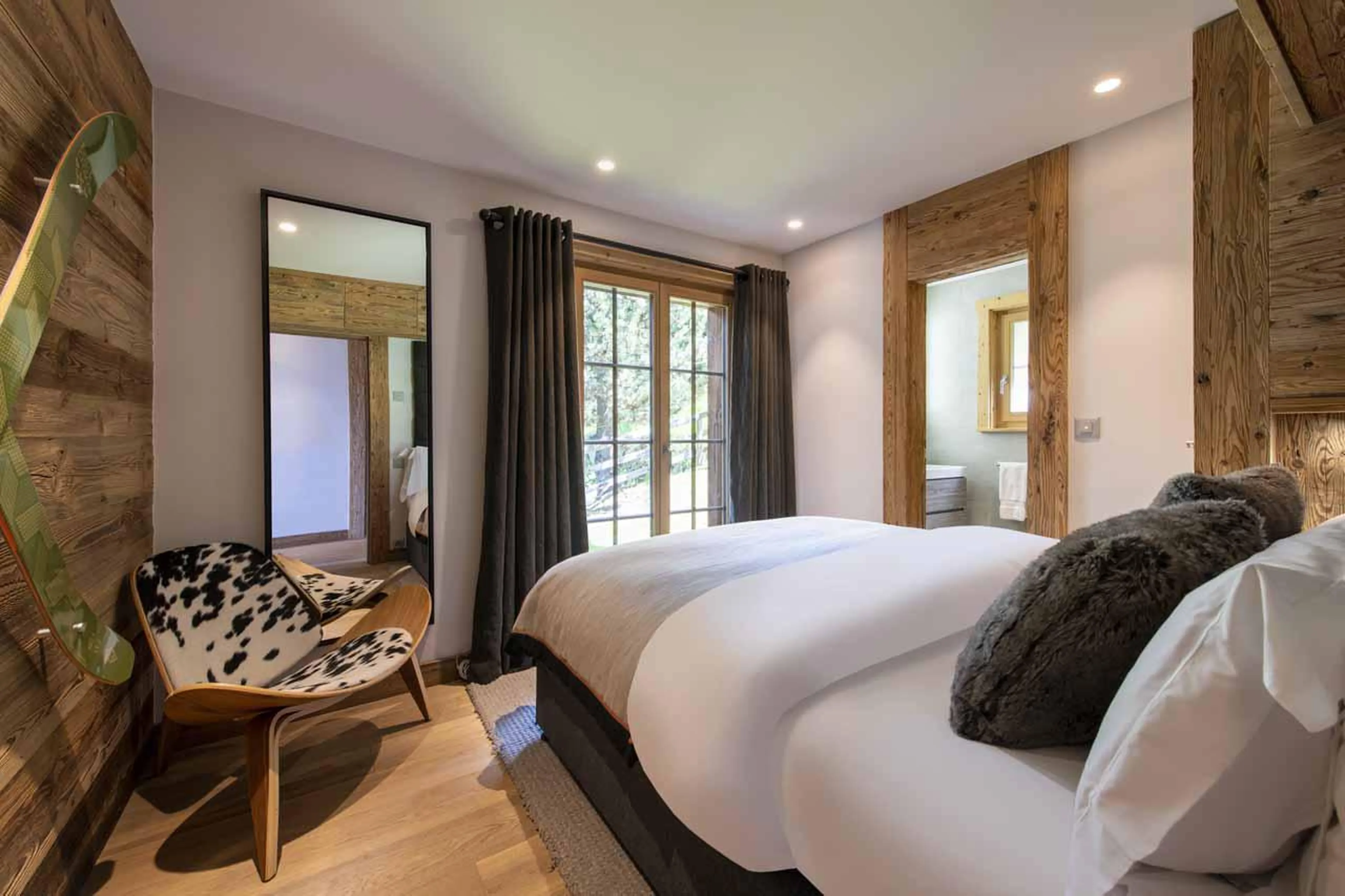 Access to terrace from bedroom three in Chalet Daphne in Verbier