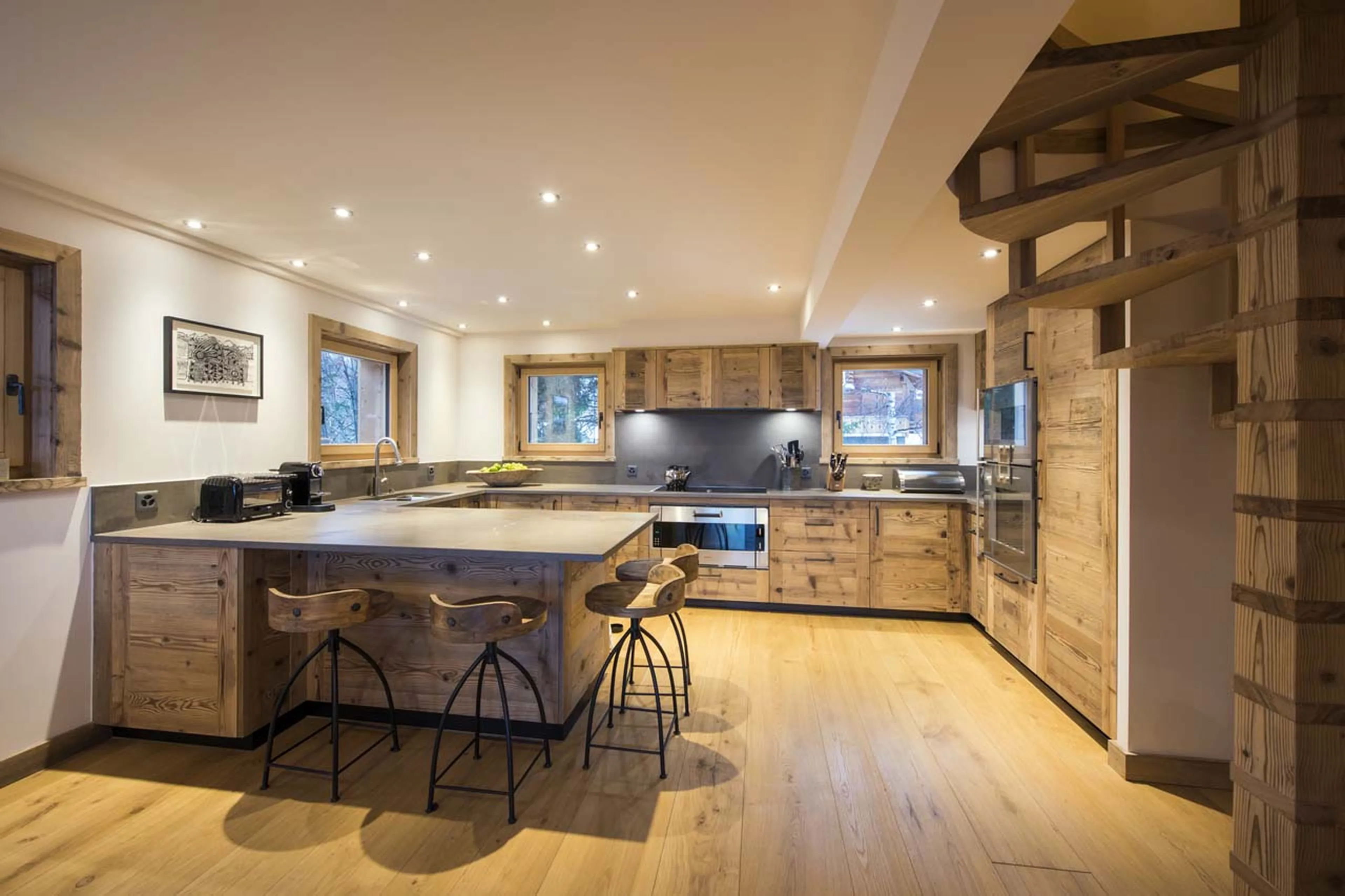 Fully-equipped kitchen in living area of Chalet Delormes in Verbier
