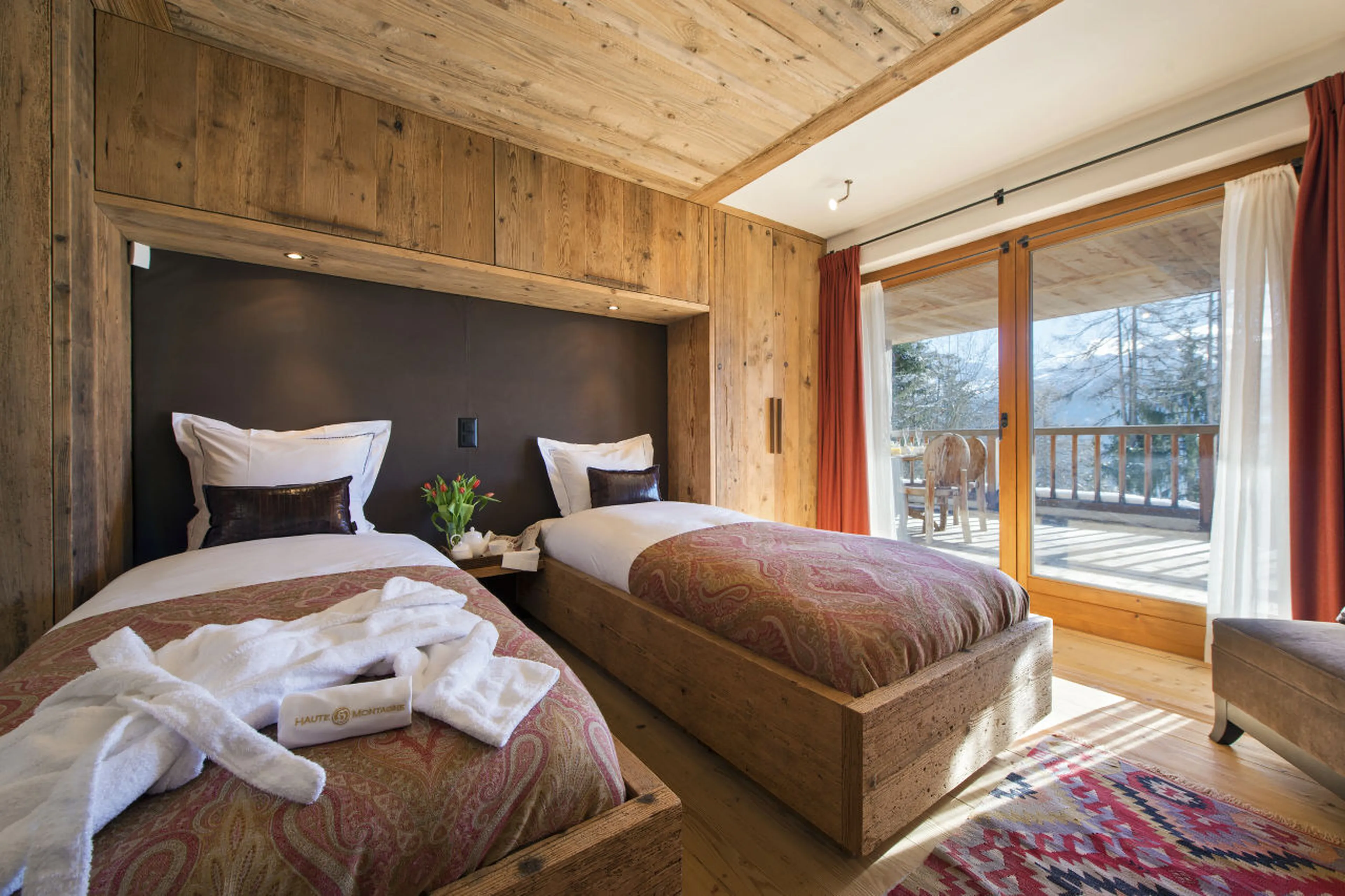 Balcony access from twin bedroom in Chalet Dent Blanche in Verbier