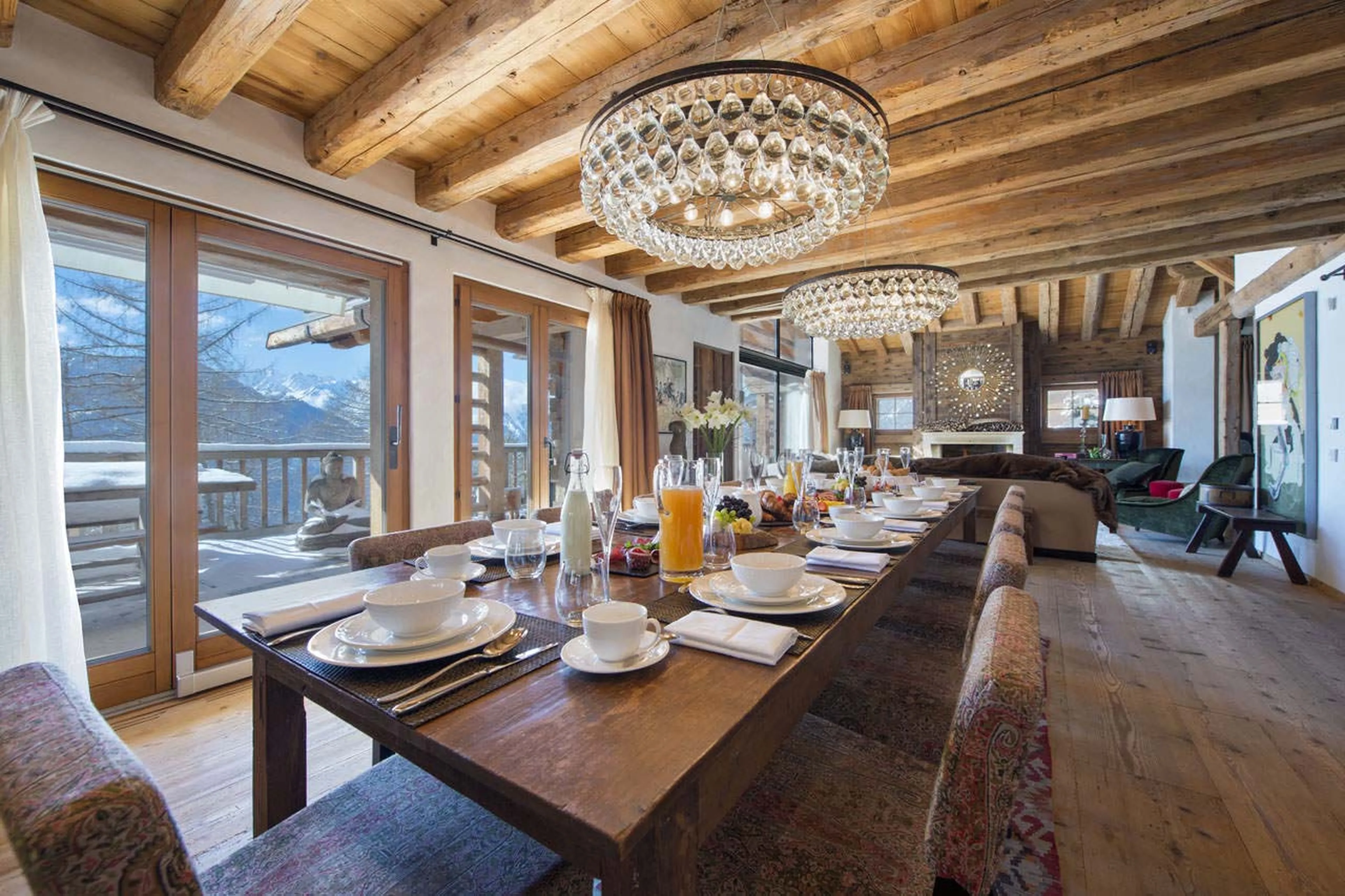 Dining room and balcony at Chalet Dent Blanche in Verbier