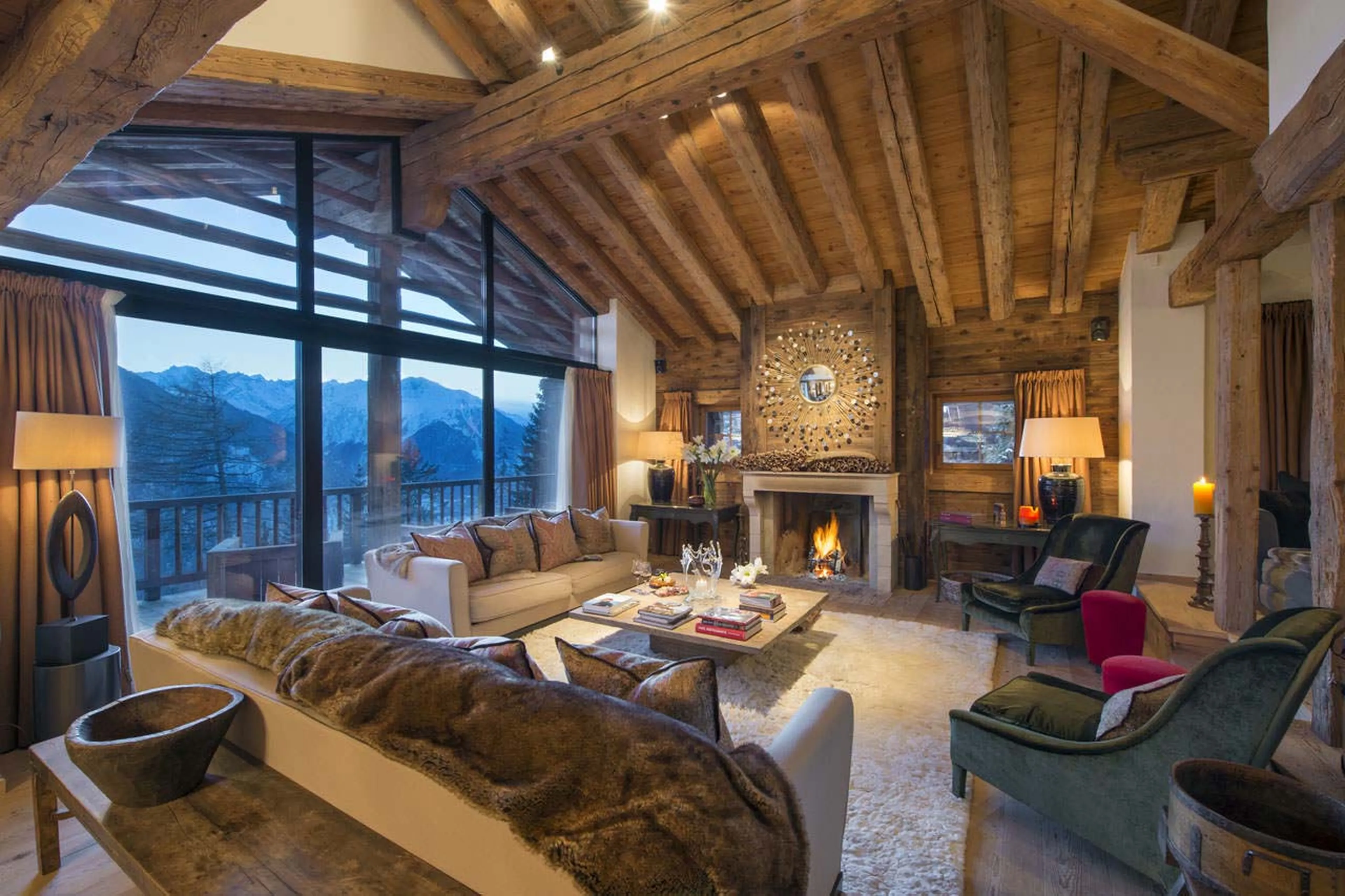 Log fire in living room of Chalet Dent Blanche in Verbier