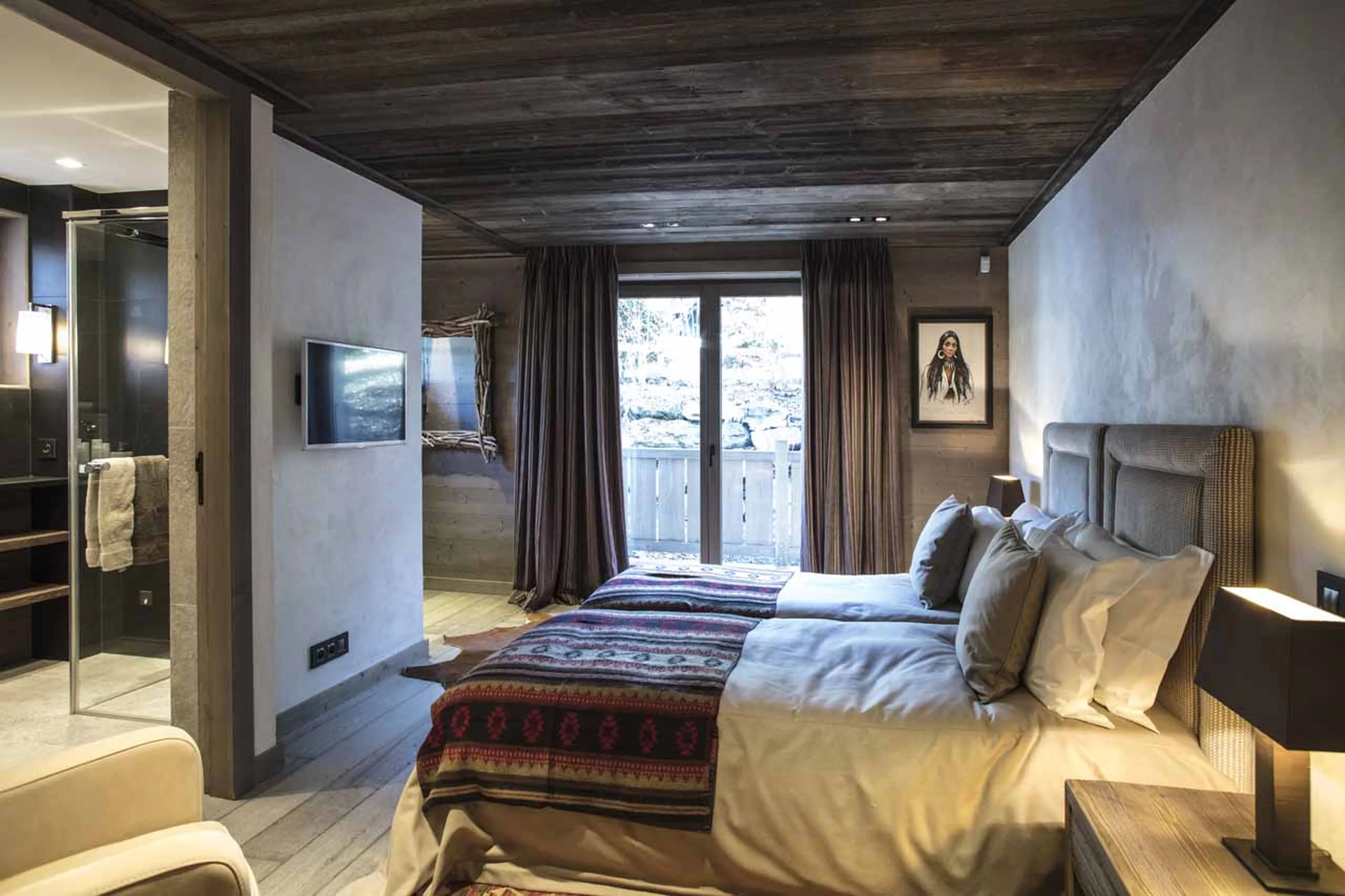 Bedroom two at Chalet des Ecureuils in Megeve