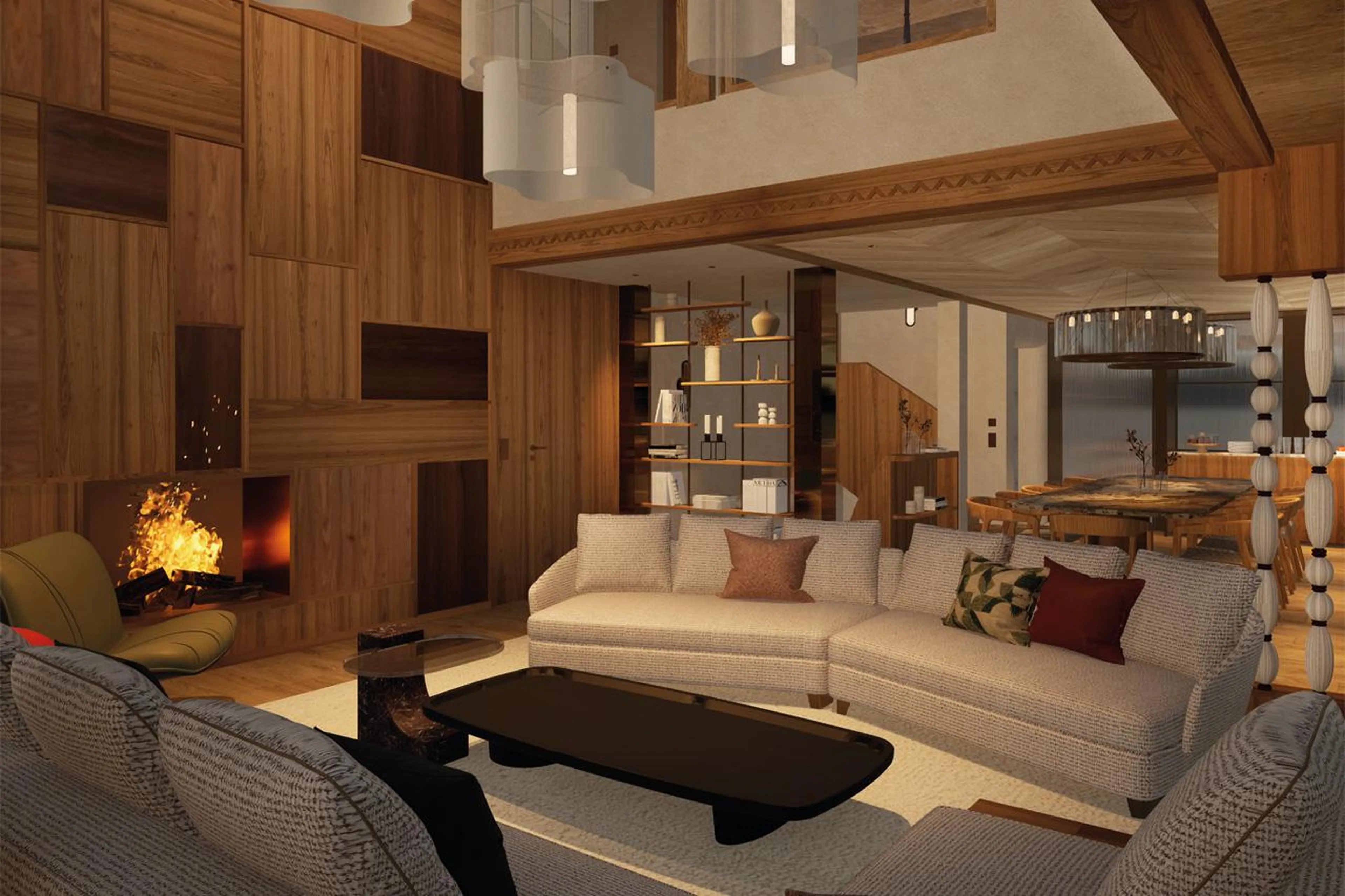 Sofas and coffee table in front of fireplace in Chalet des Legendes, Val d'Isere