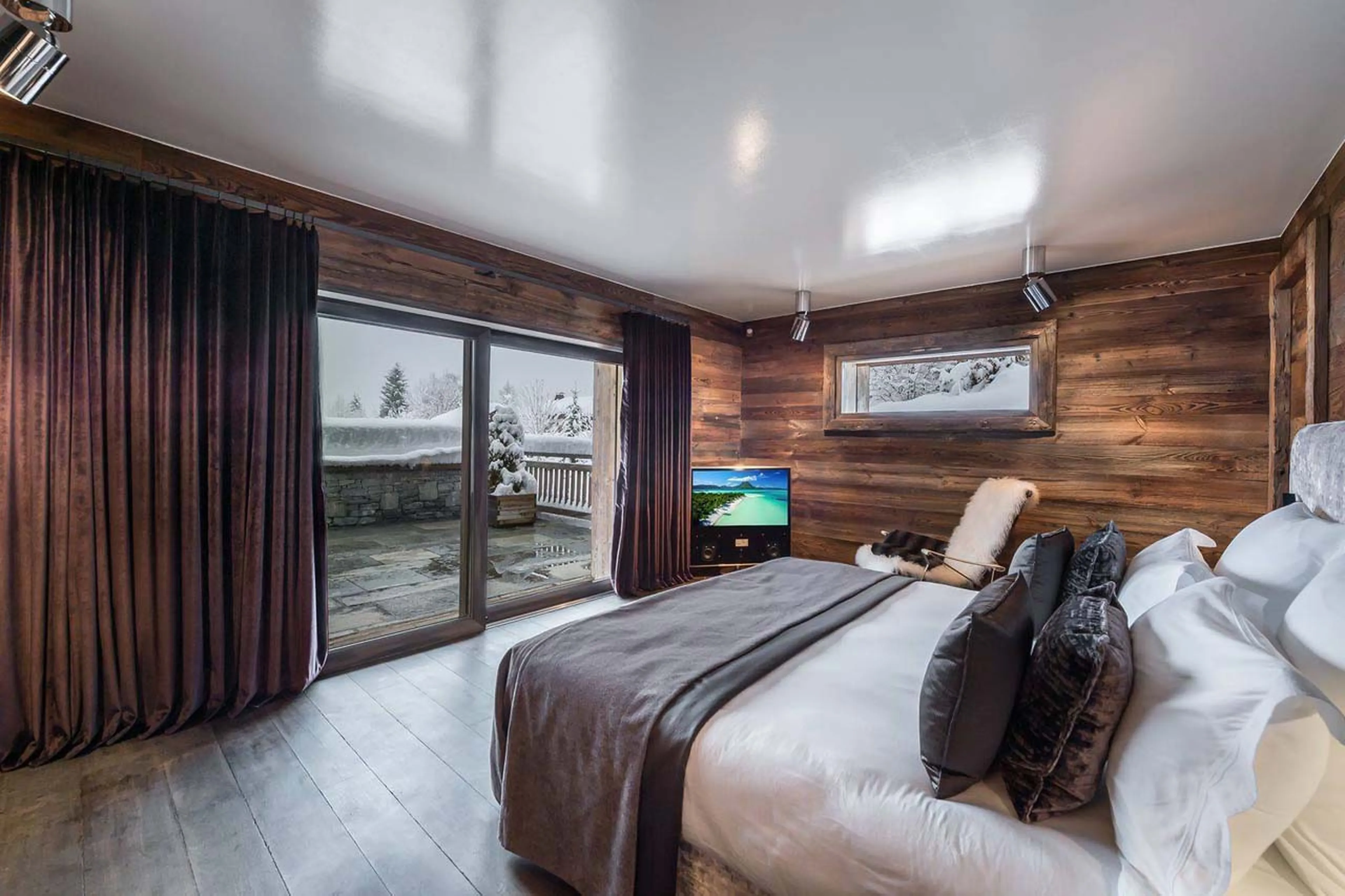 Bedroom two terrace access at Chalet Des Sens in Megeve