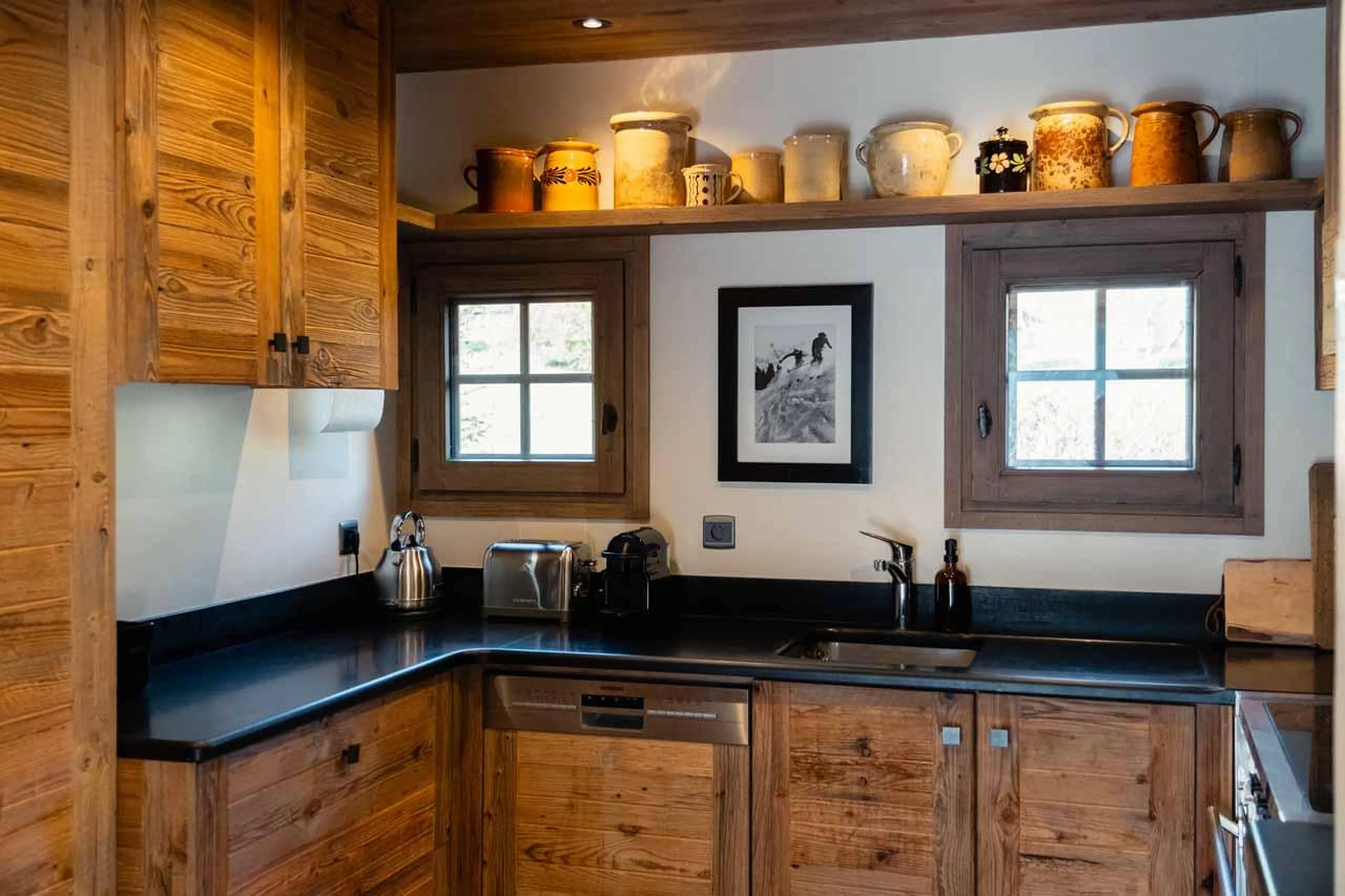Kitchen with wooden facade in Chalet Donatien, Megeve