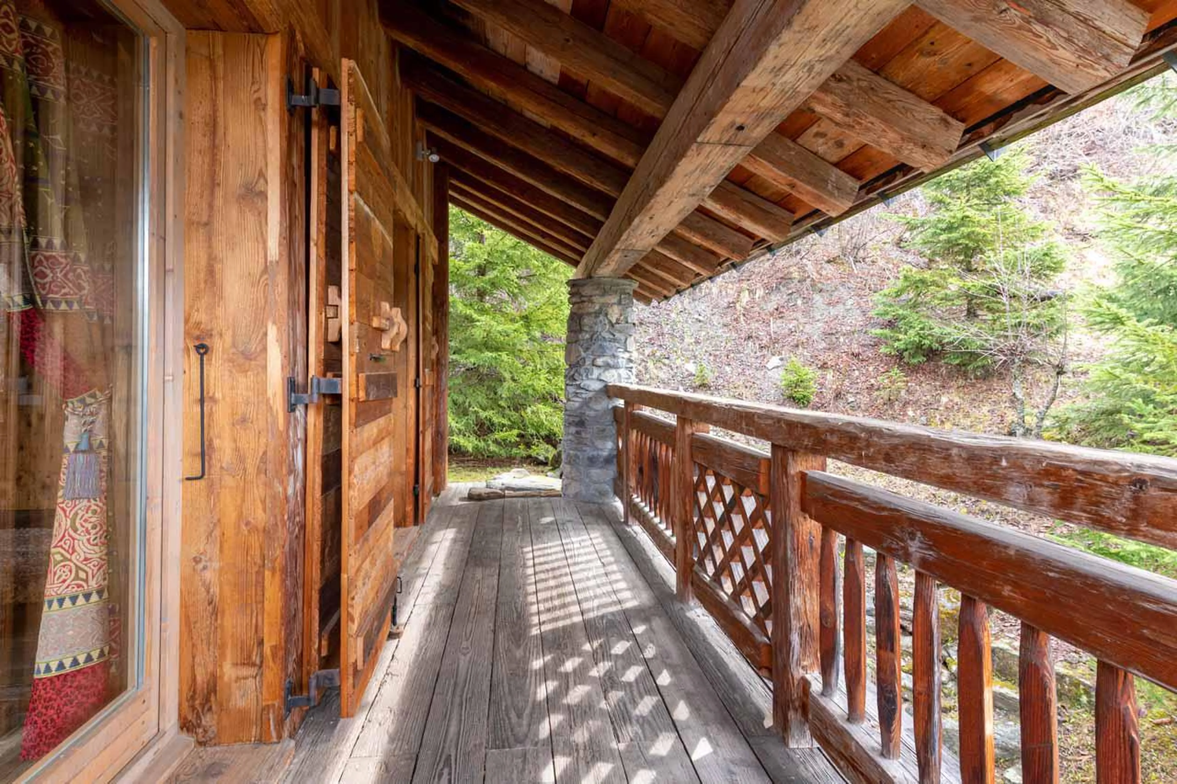 Balcony access from bedroom one at Chalet Druchka in Meribel