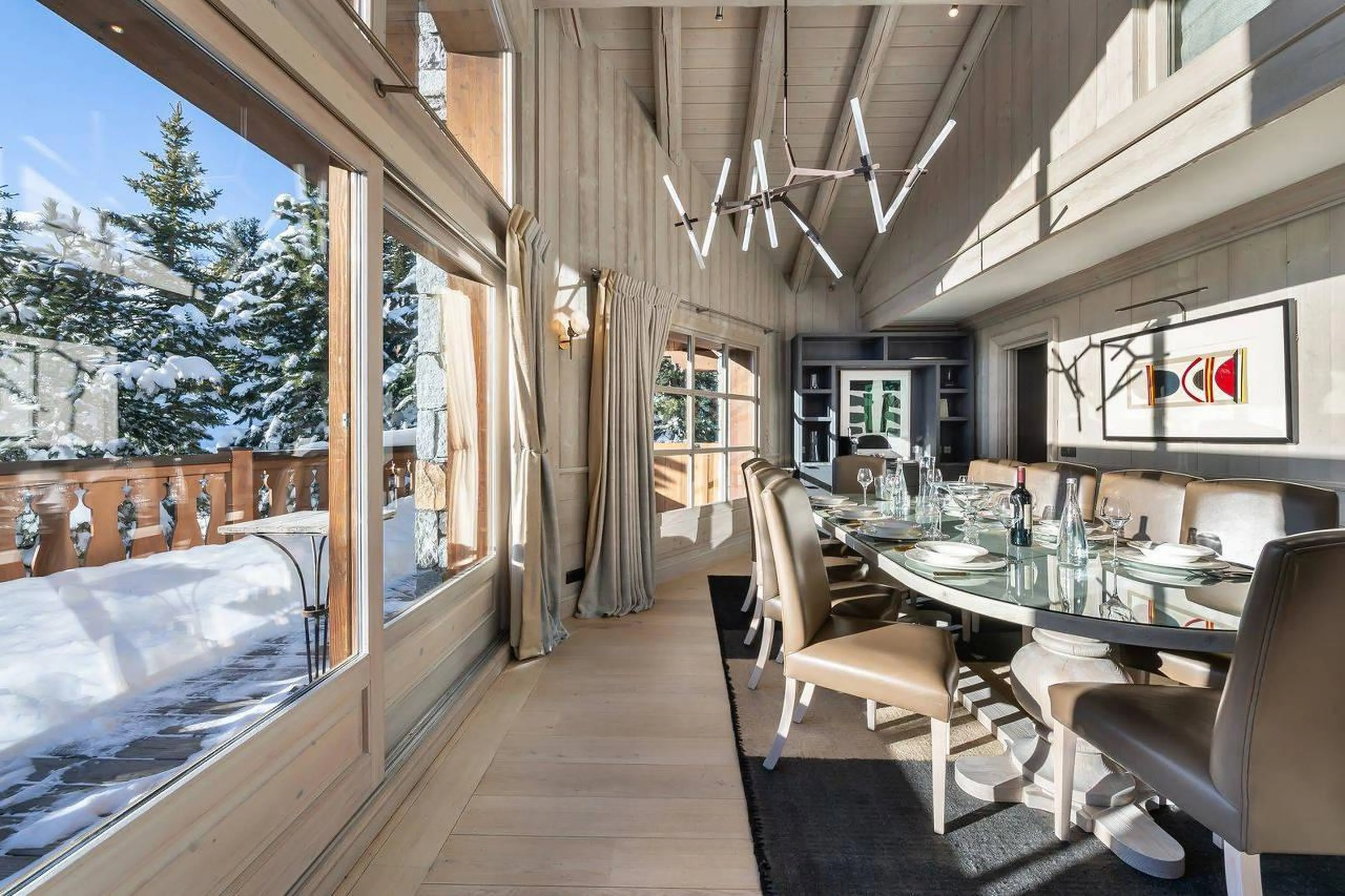 Dining area inundated in sunlight, Chalet Edelstone in Courchevel 1850