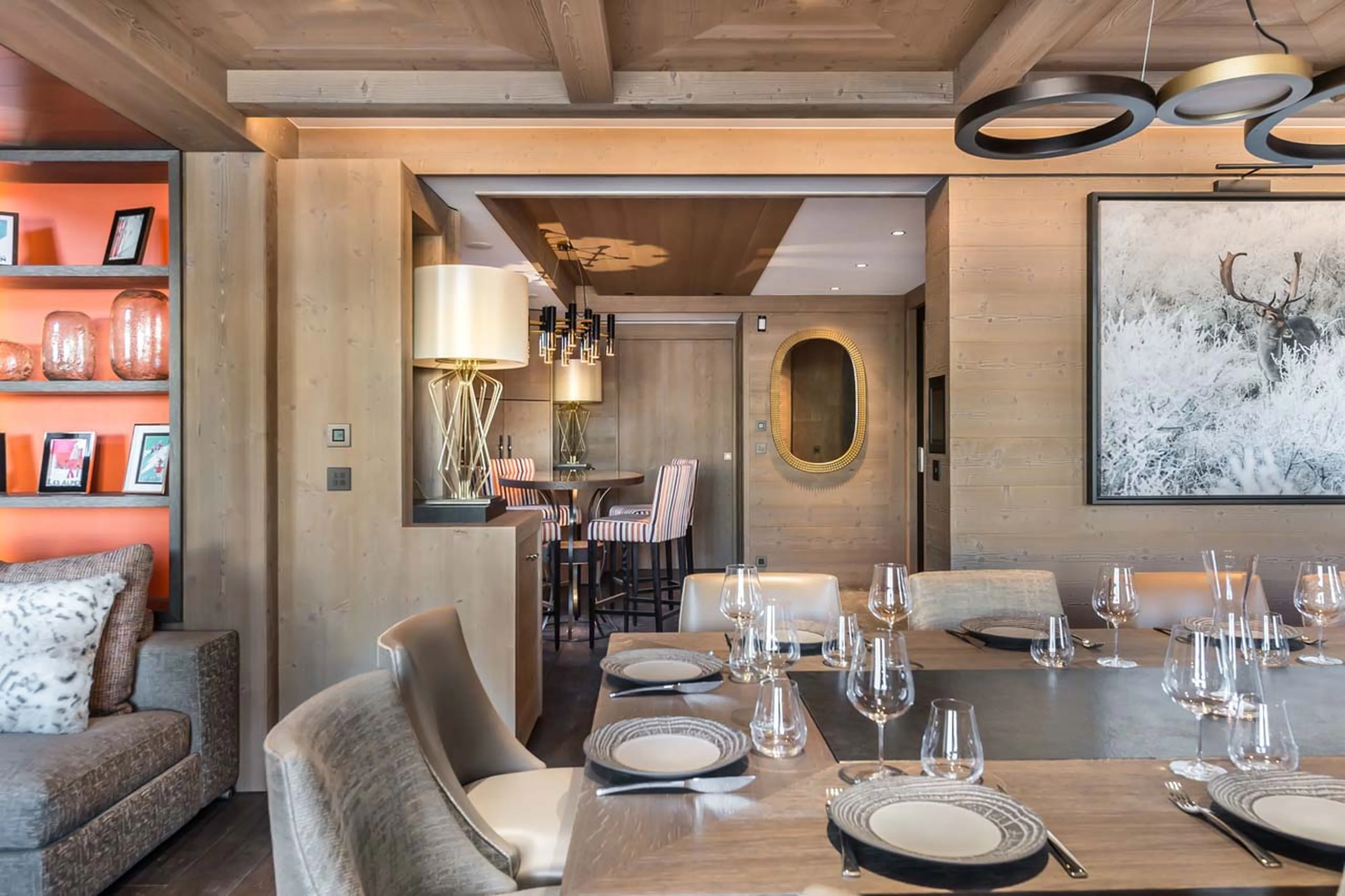 Dining table and bar seating at Chalet Elixir in Courchevel 1850