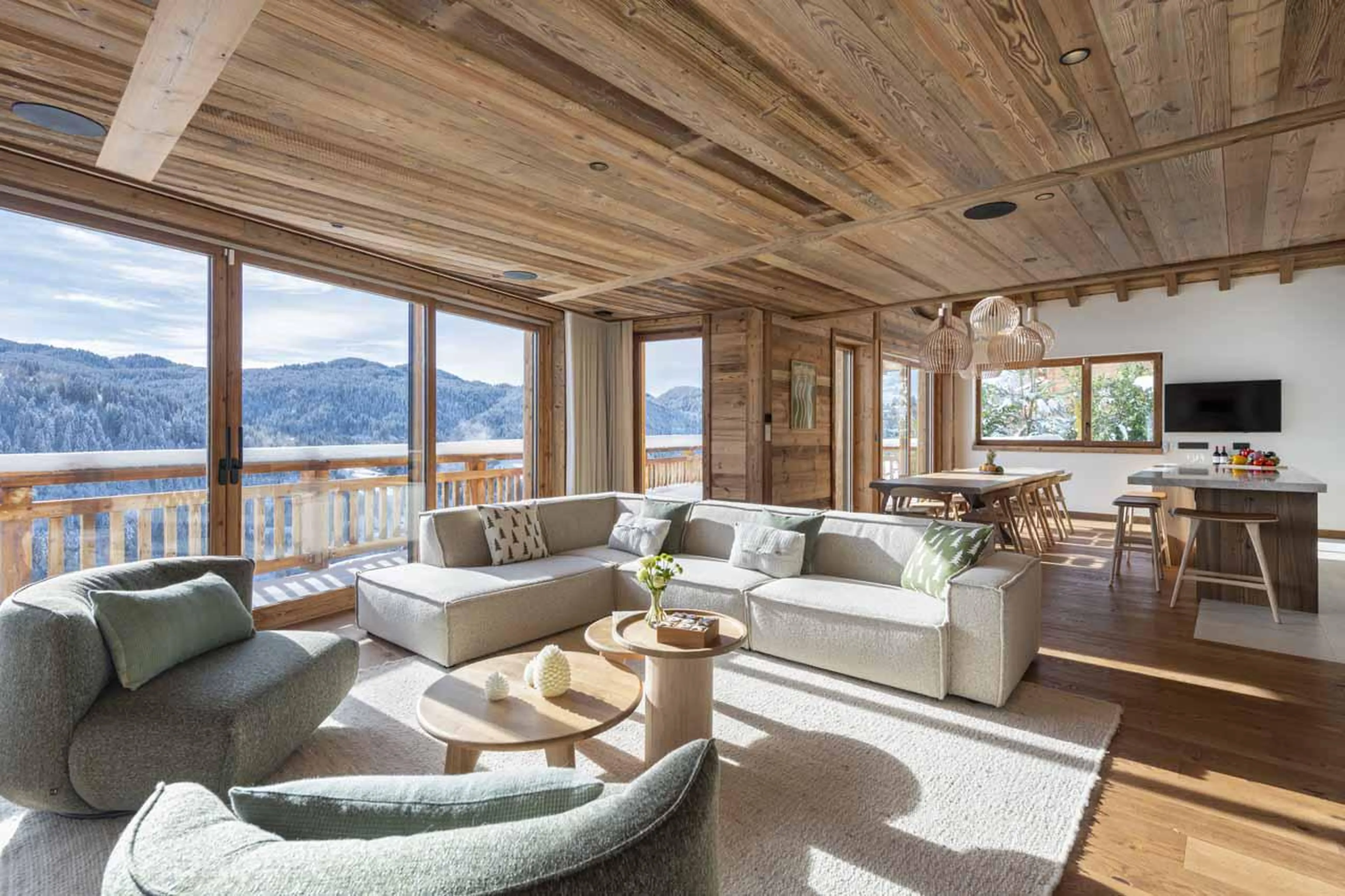 Wrap-around sofa and armchairs in Chalet Fika, Les Gets