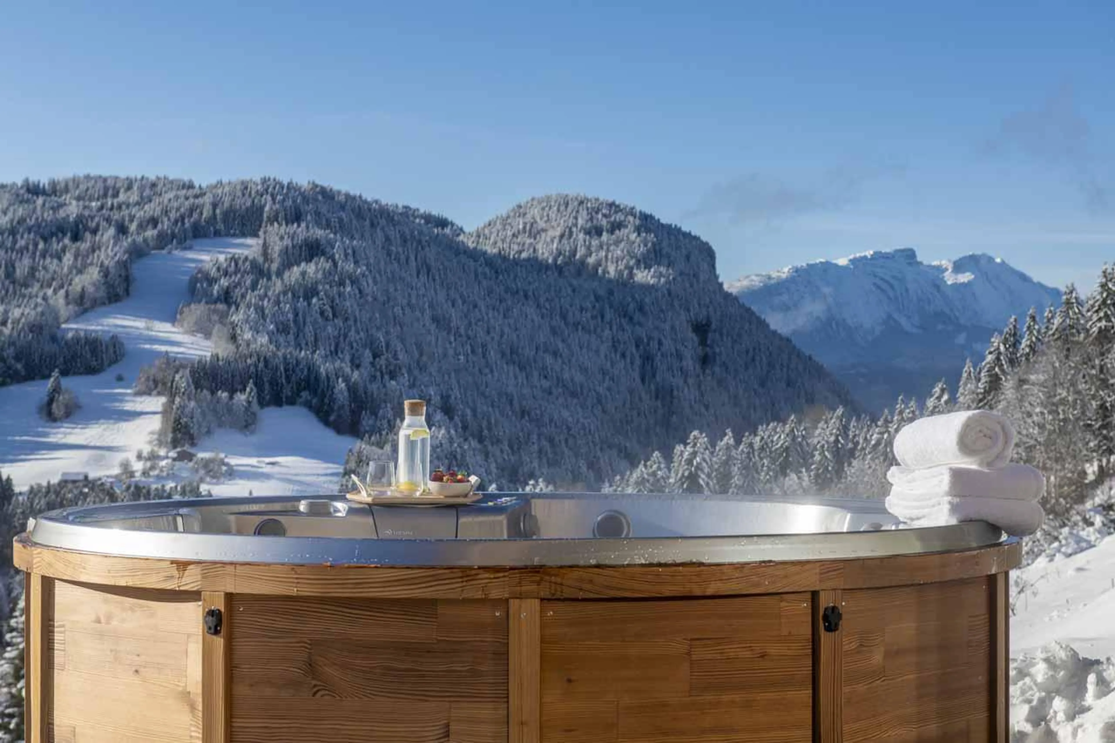 Hot tub with valley views in Chalet Fika, Les Gets
