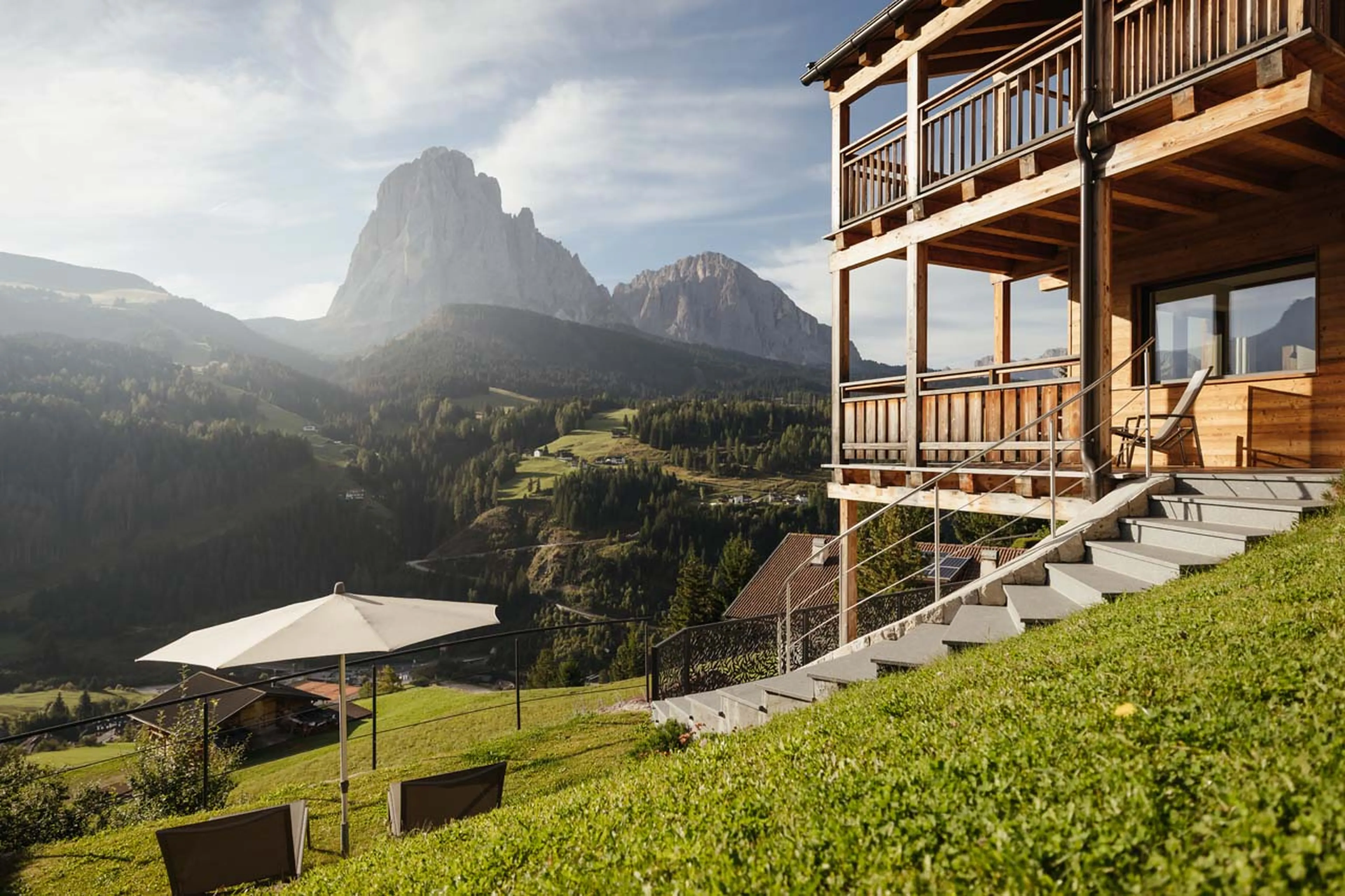 Exterior with mountain views in summer at Chalet Filip, Val Gardena