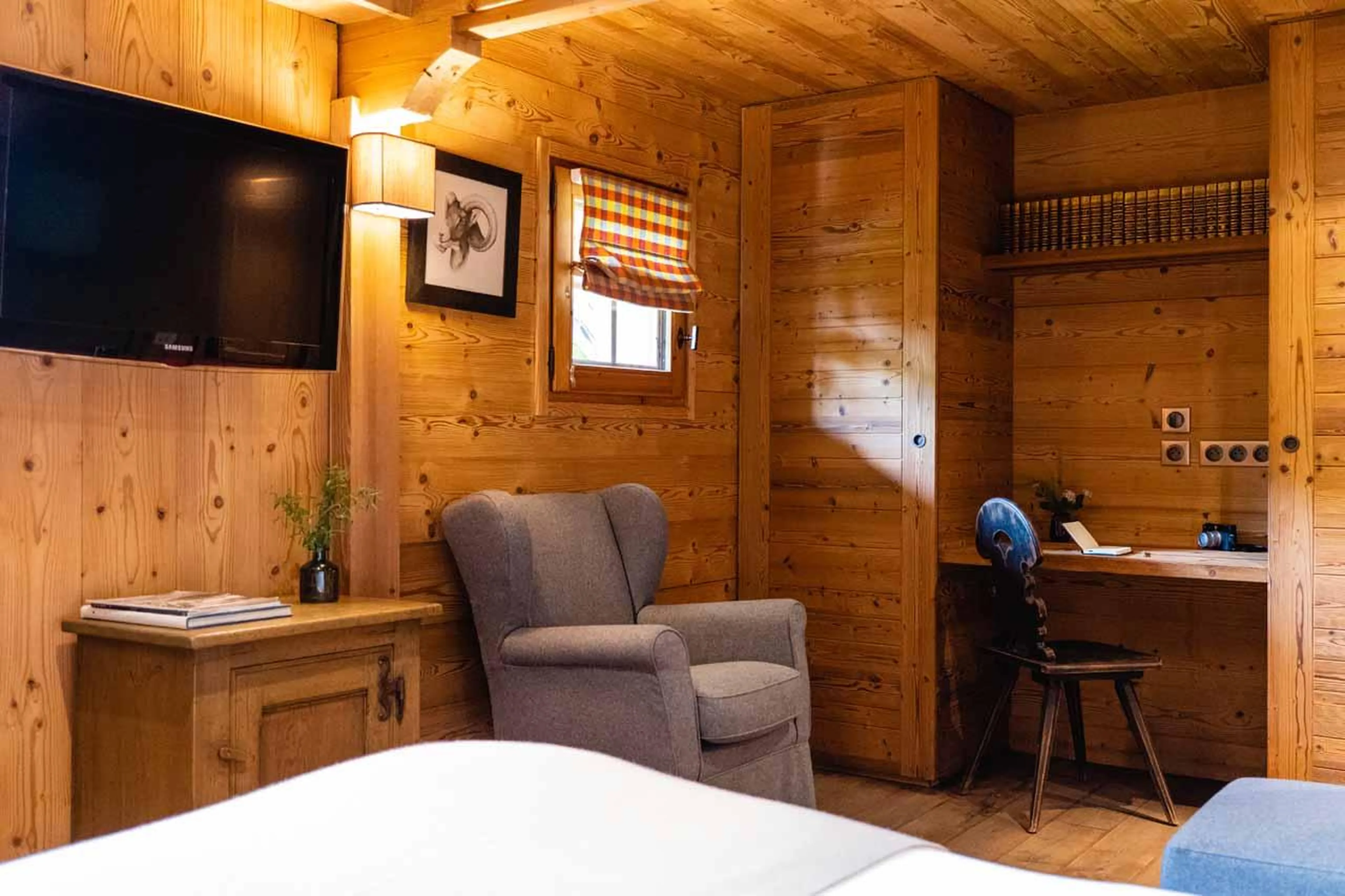 TV and desk in double bedroom in Chalet Firmin, Megeve