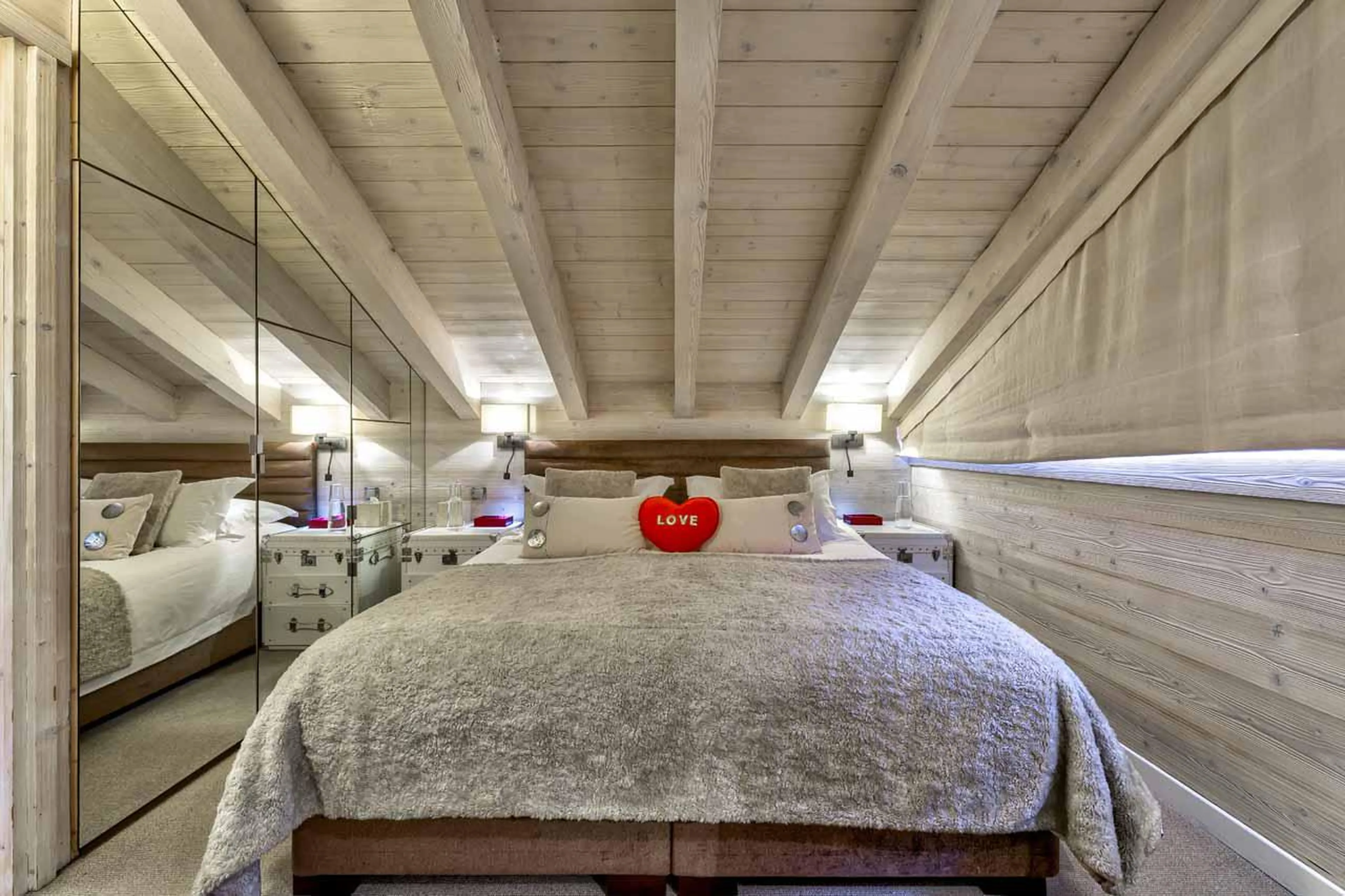 Master bedroom with super-king size bed at Floralie Penthouse in St Martin de Belleville