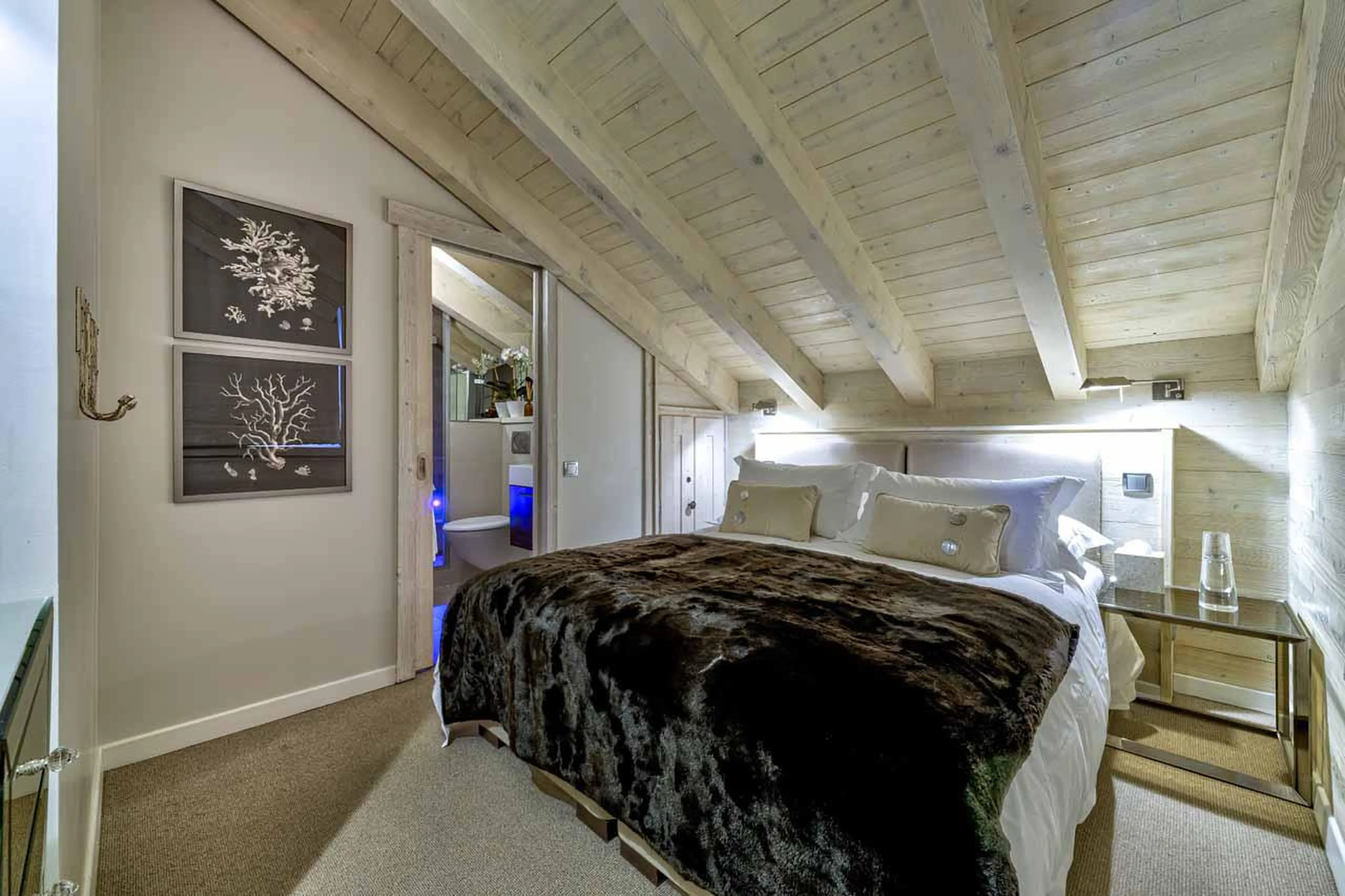 Penthouse bedroom at Chalet Floralie in St Martin de Belleville