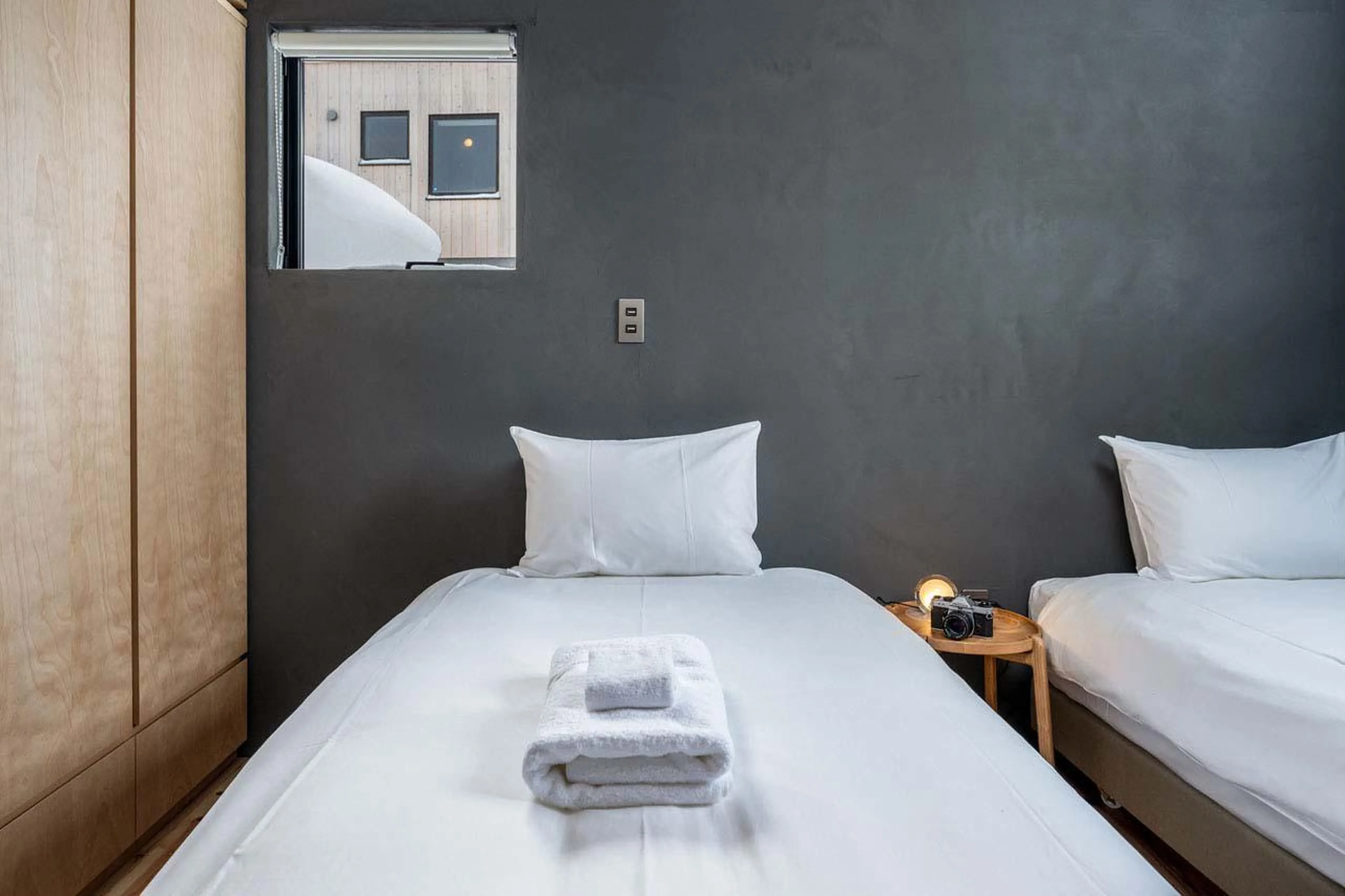 Bedroom with ample storage space at Chalet Foxwood B in Niseko