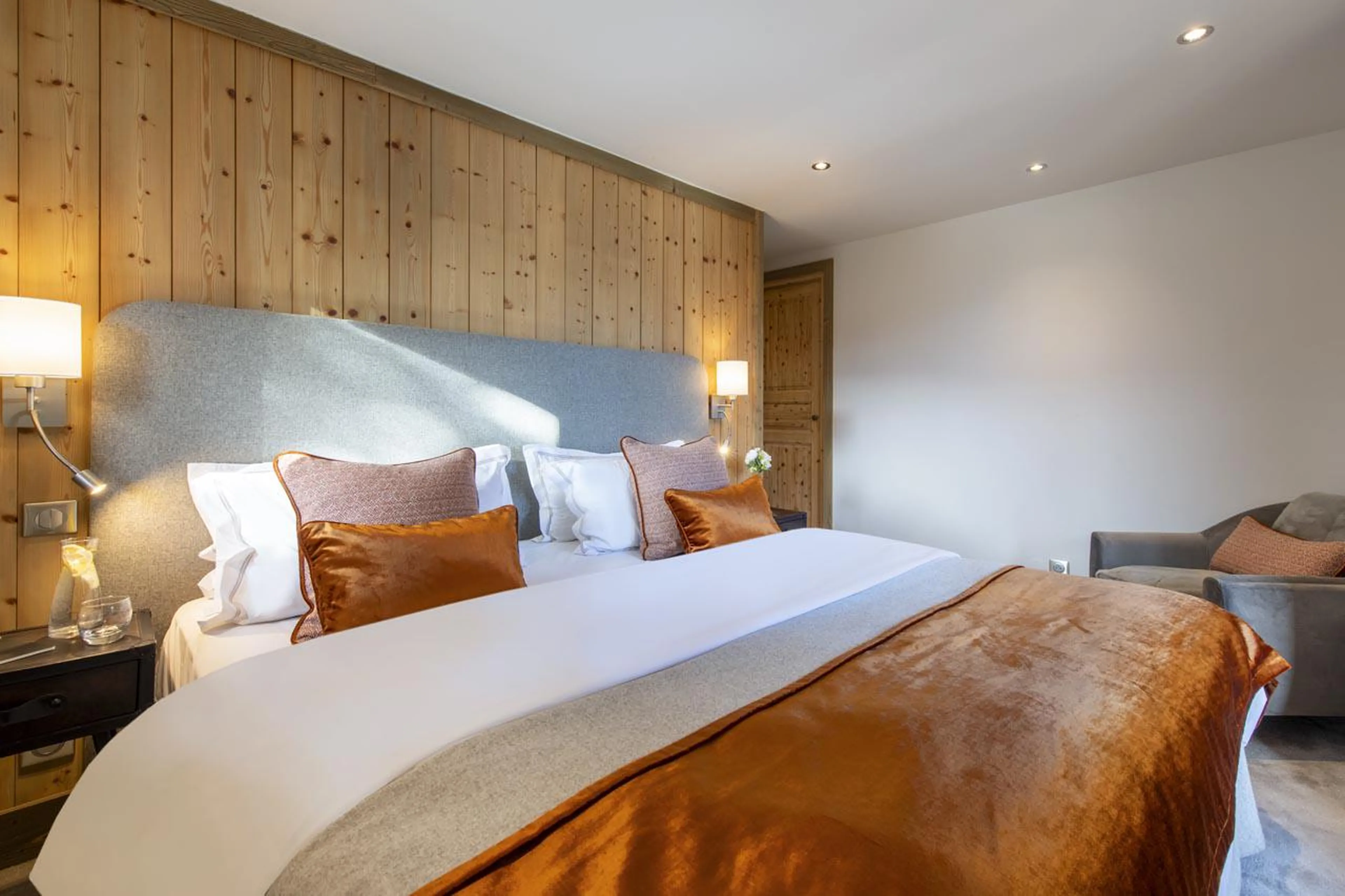 Warm and homely bedroom at Chalet Genepi in Meribel