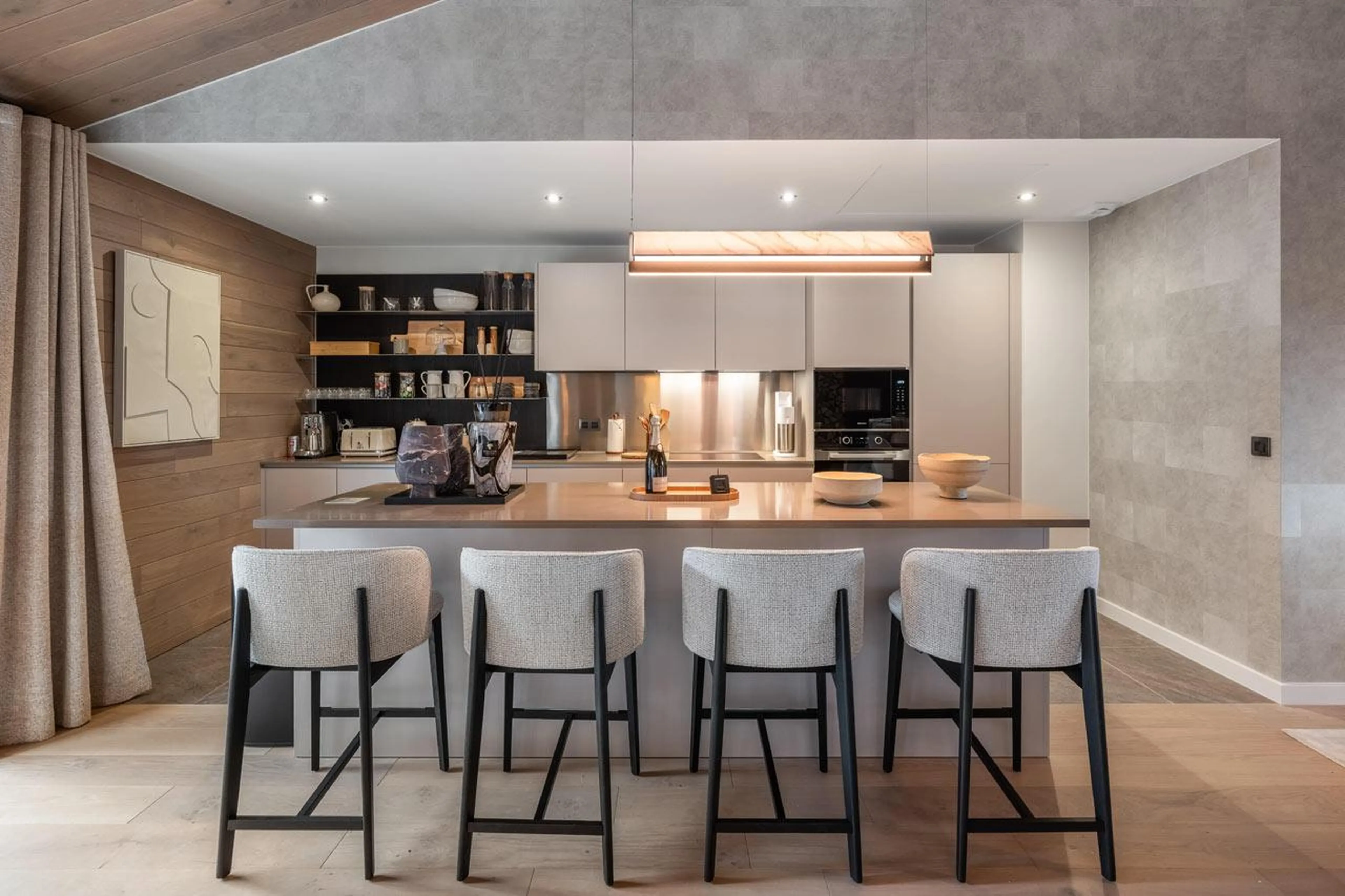 Kitchen with island and high seating in Chalet Goyard, Courchevel 1650