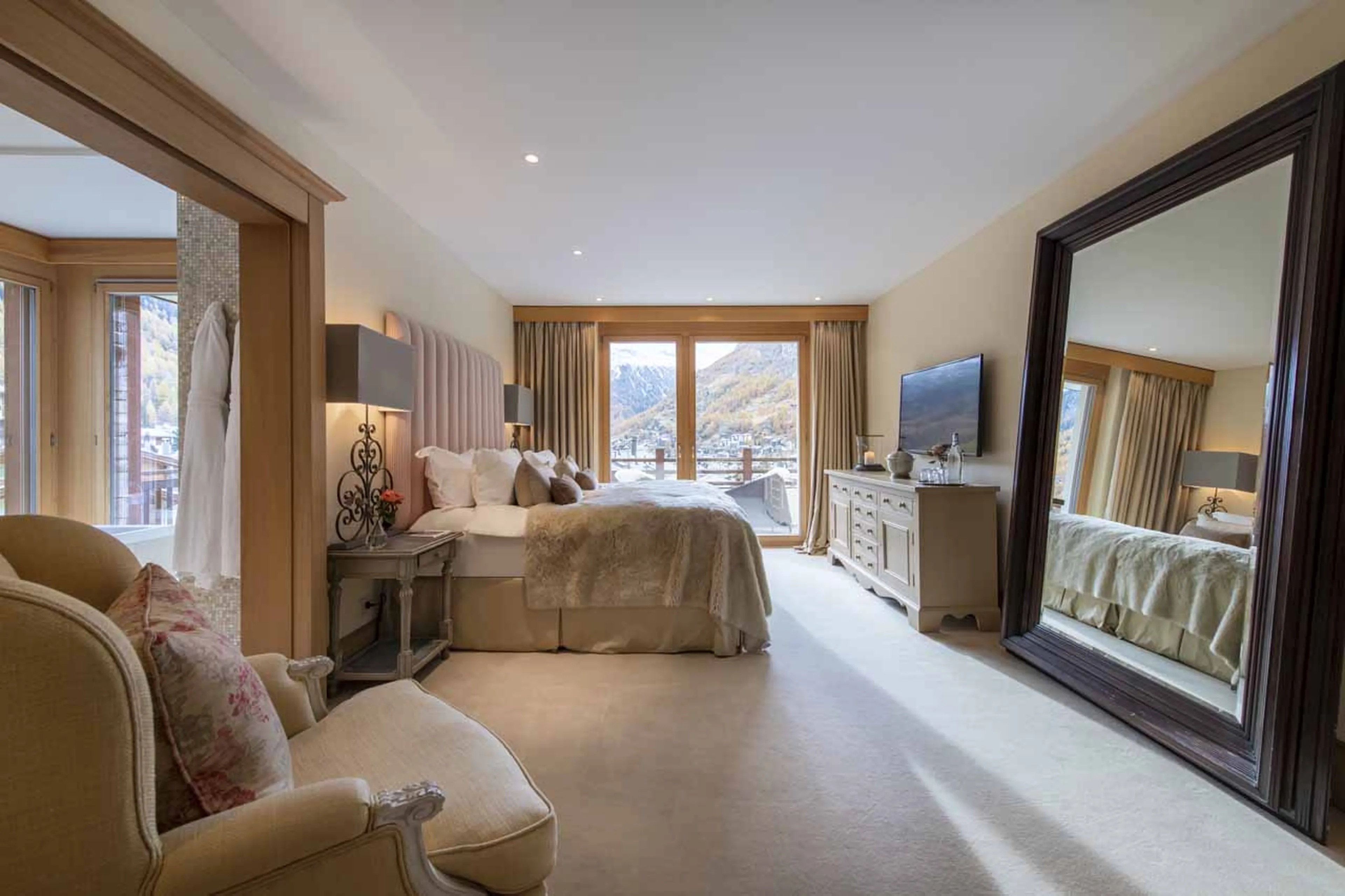 Large mirror in master bedroom at Chalet Grace in Zermatt