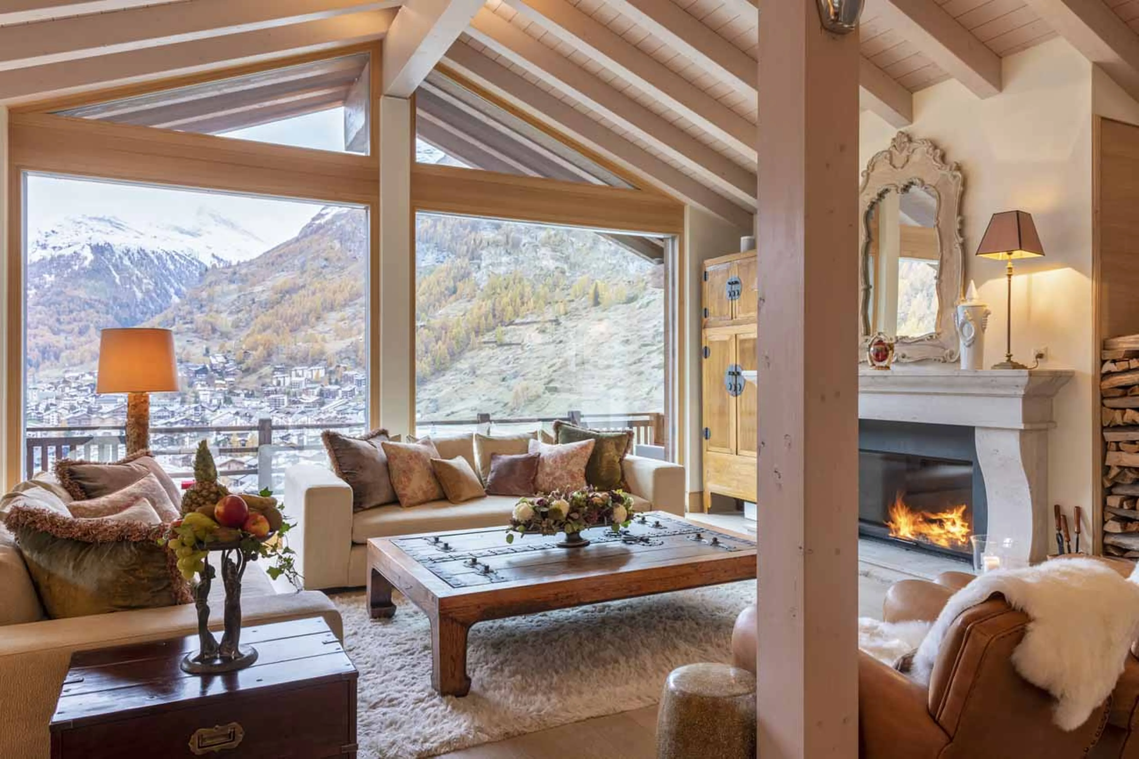 Fireplace and views over the village from Chalet Grace in Zermatt