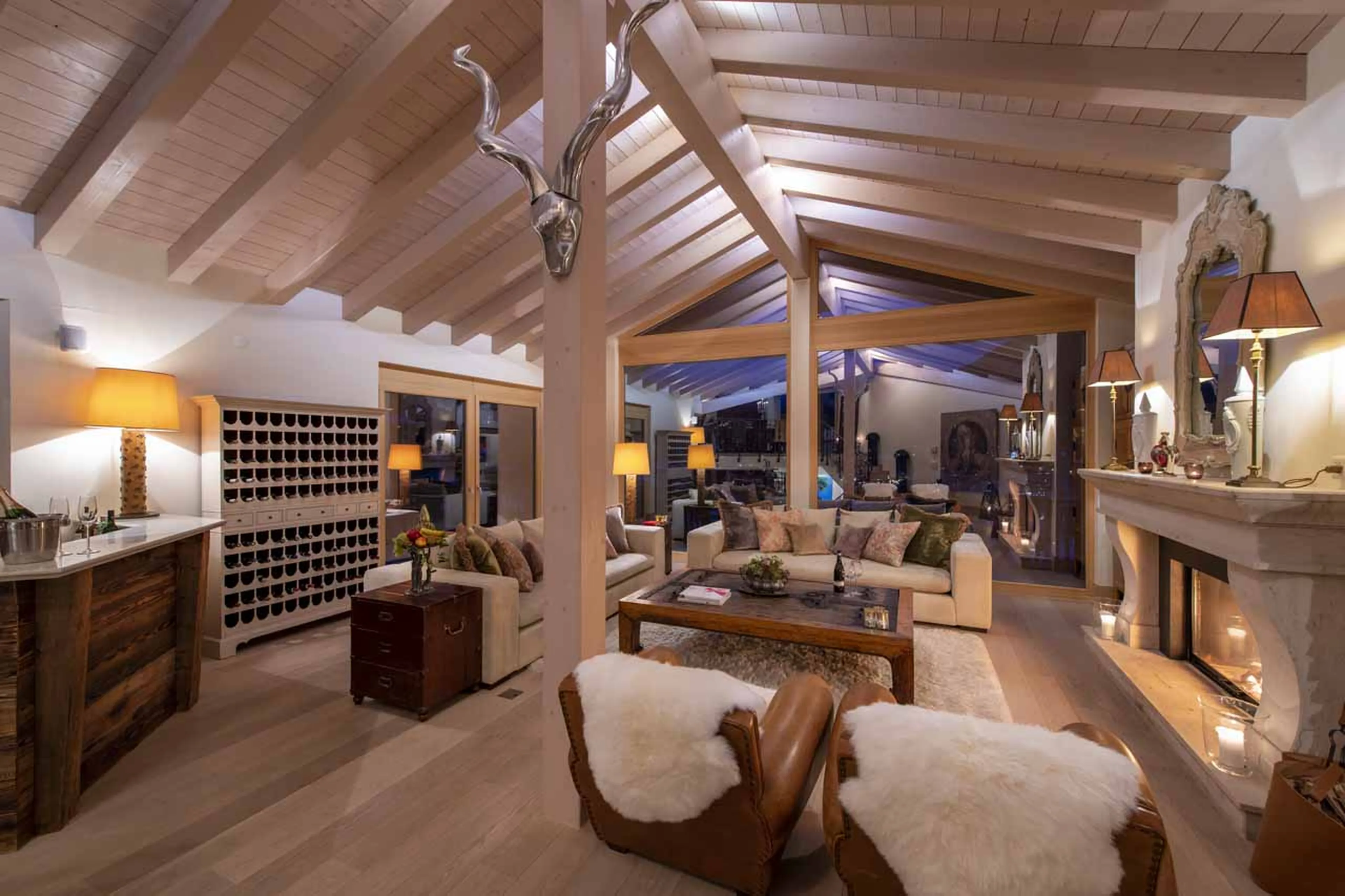 Living room and bar at Chalet Grace in Zermatt