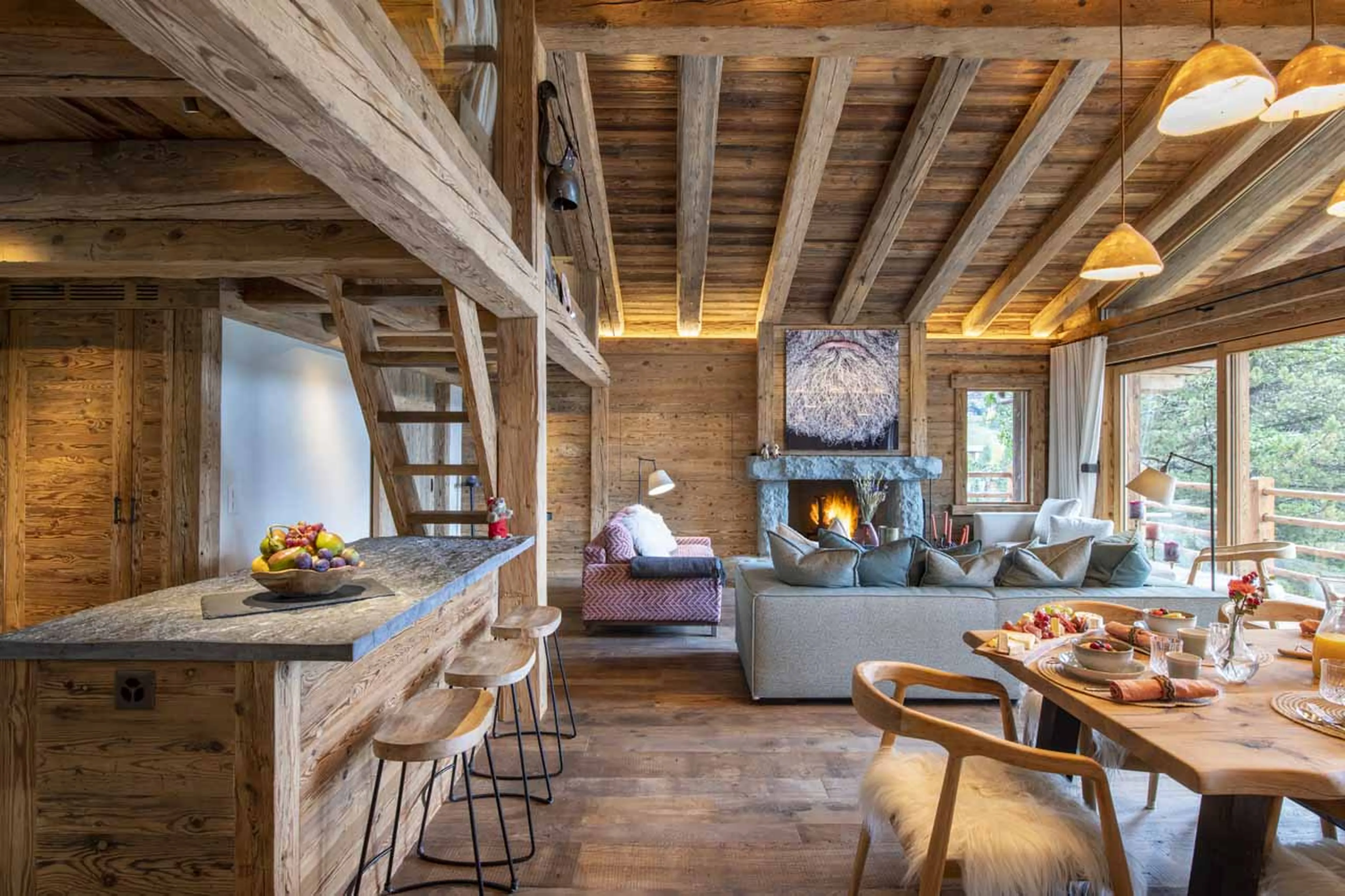 Dining area and kitchen at Chalet Grand Coeur in Verbier