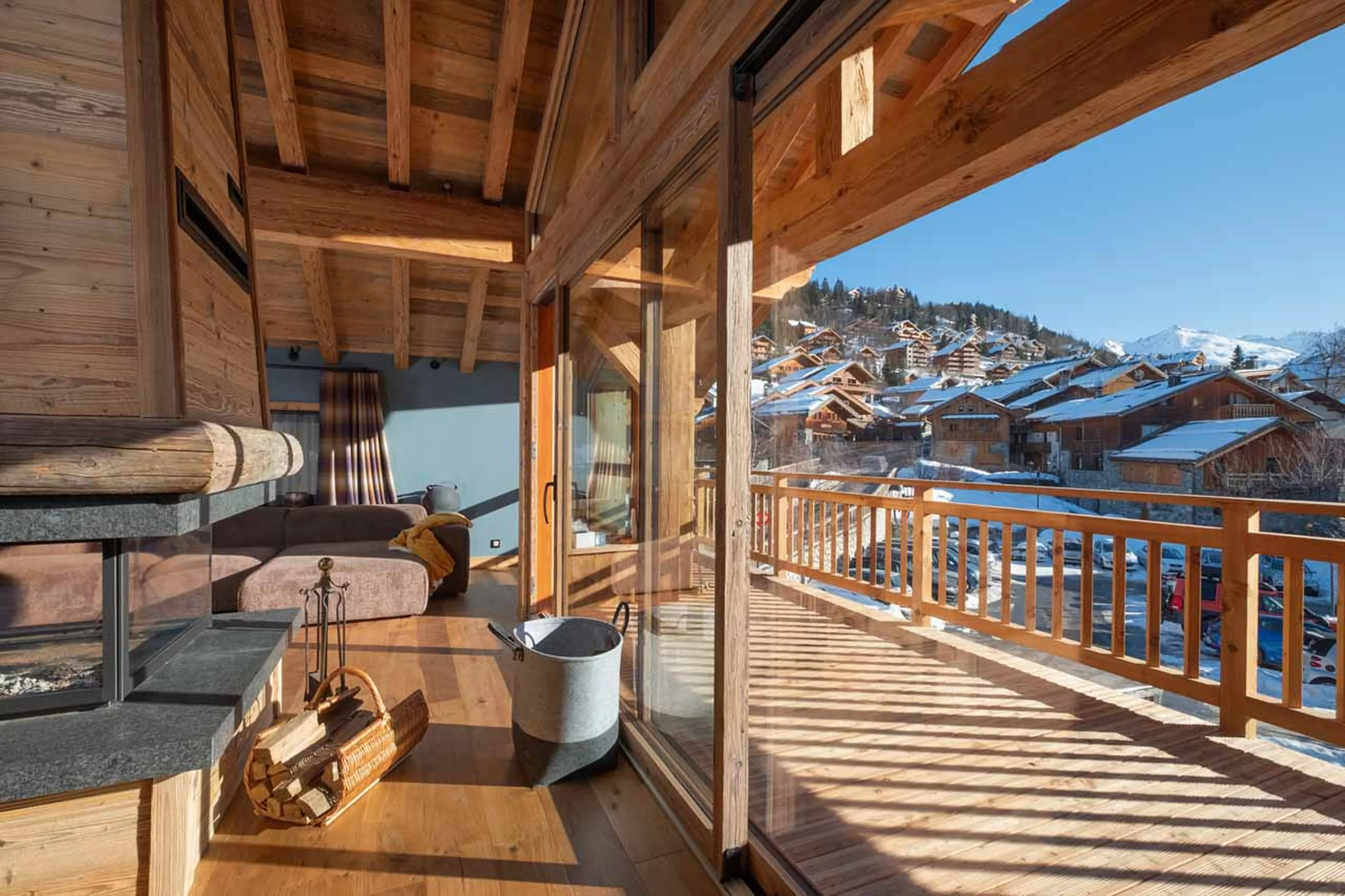 Floor-to-ceiling glass doors leading to balcony in Chalet Grande Kalinka, Meribel