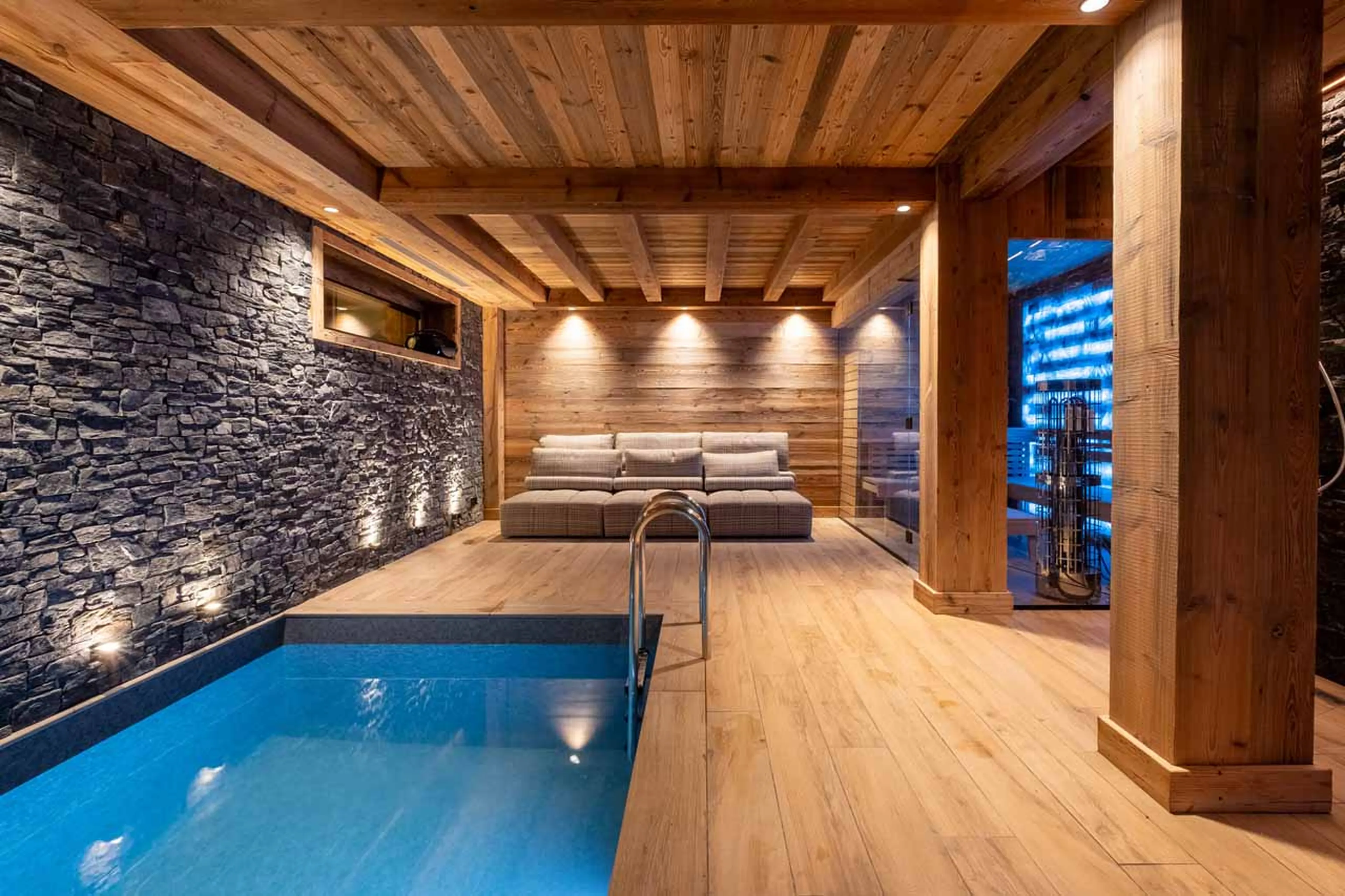 Indoor swimming pool and relaxation area in Chalet Grande Kalinka, Meribel